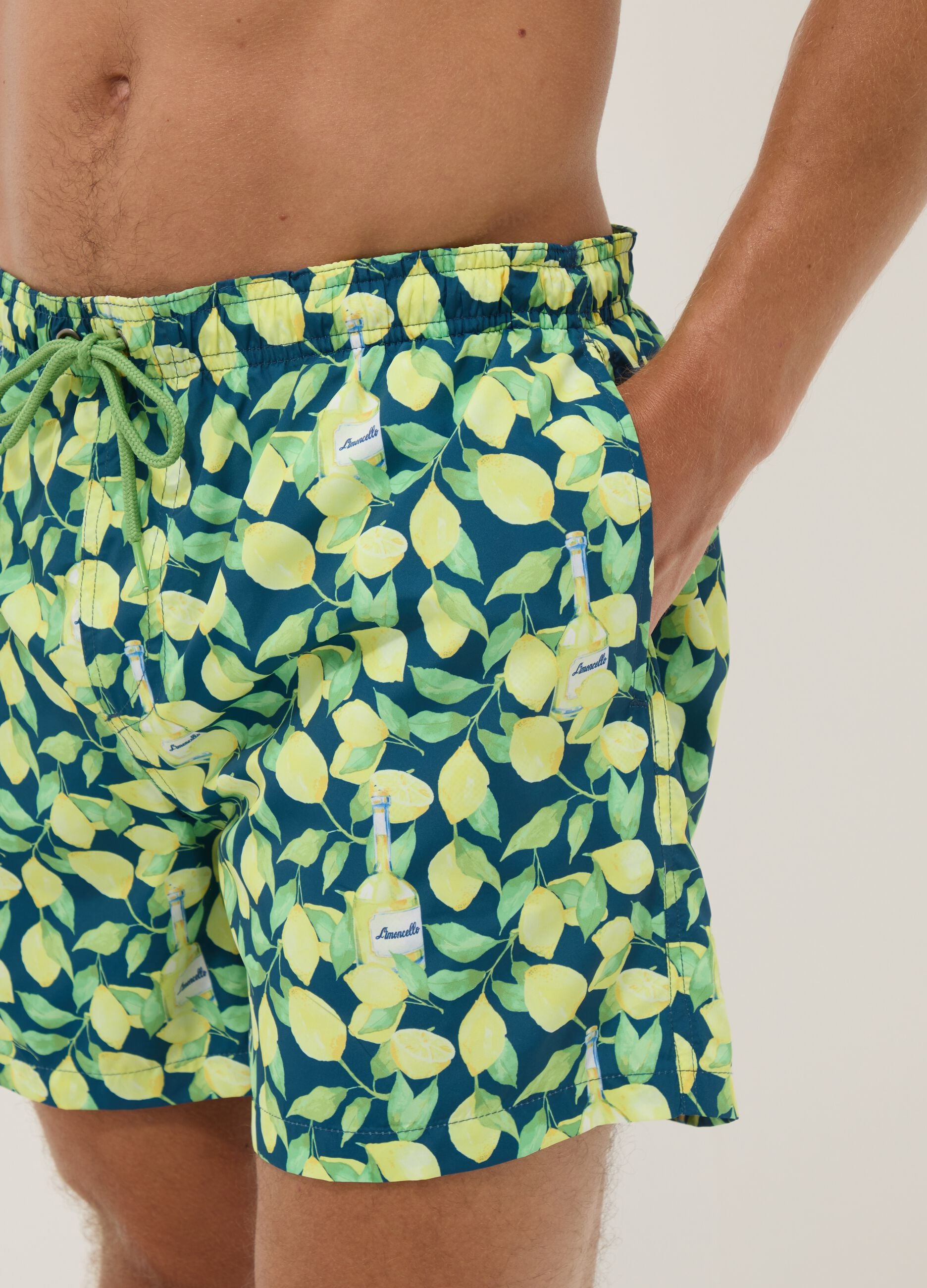 Blue boxer swim shorts with Limoncello print