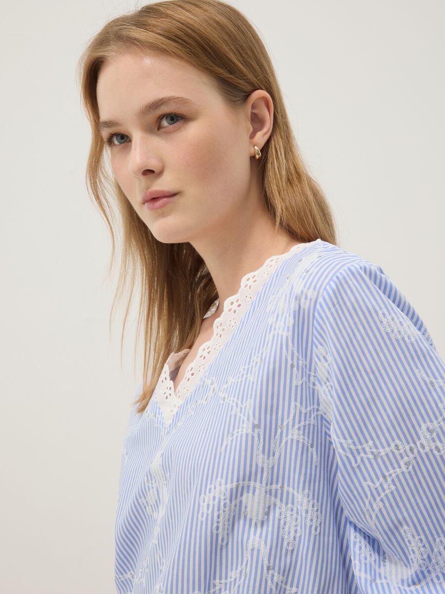 Blue cotton-blend top with embroidery and V-neck_0
