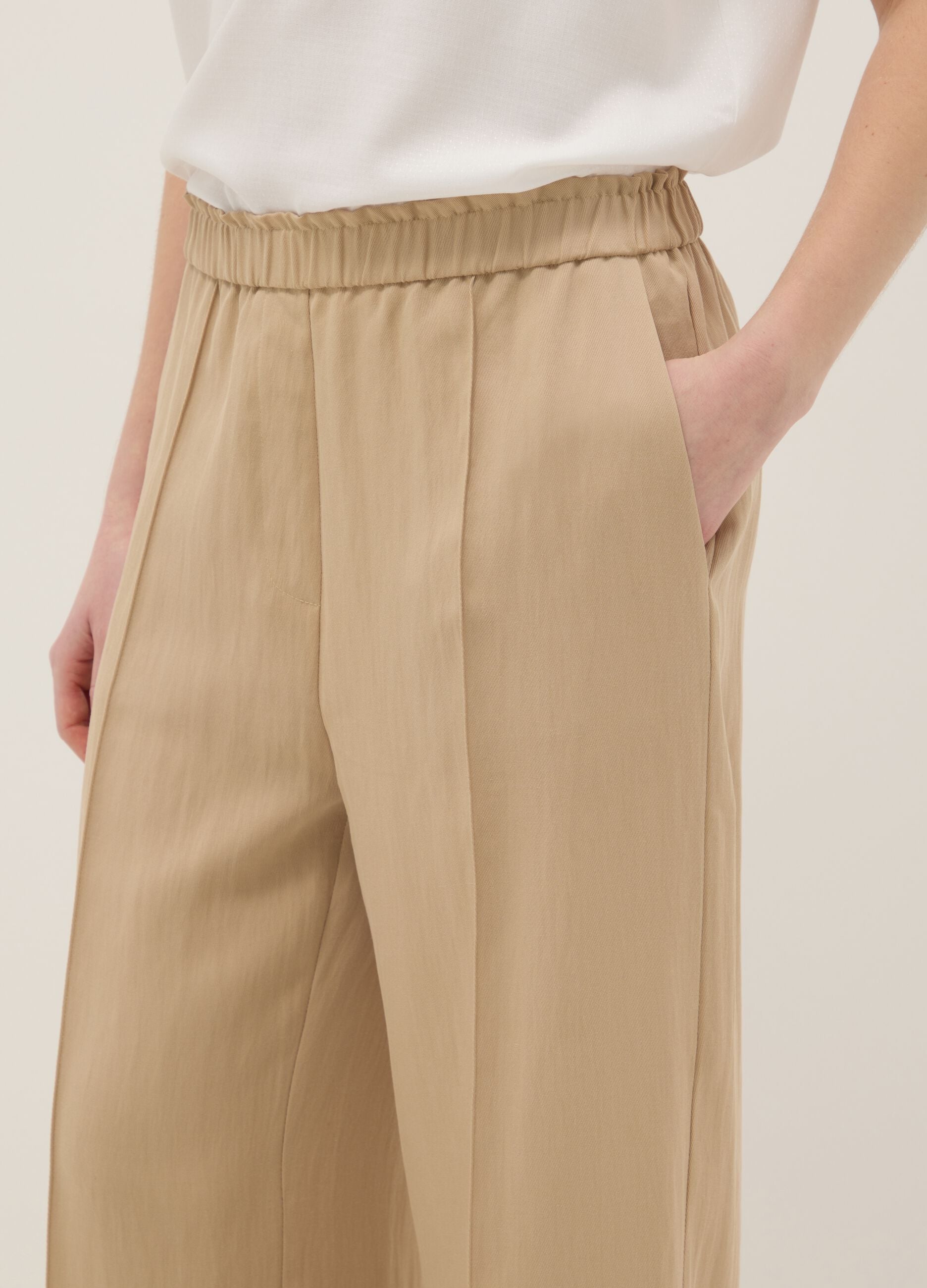 Beige wide leg jogger trousers in Lyocell and viscose blend