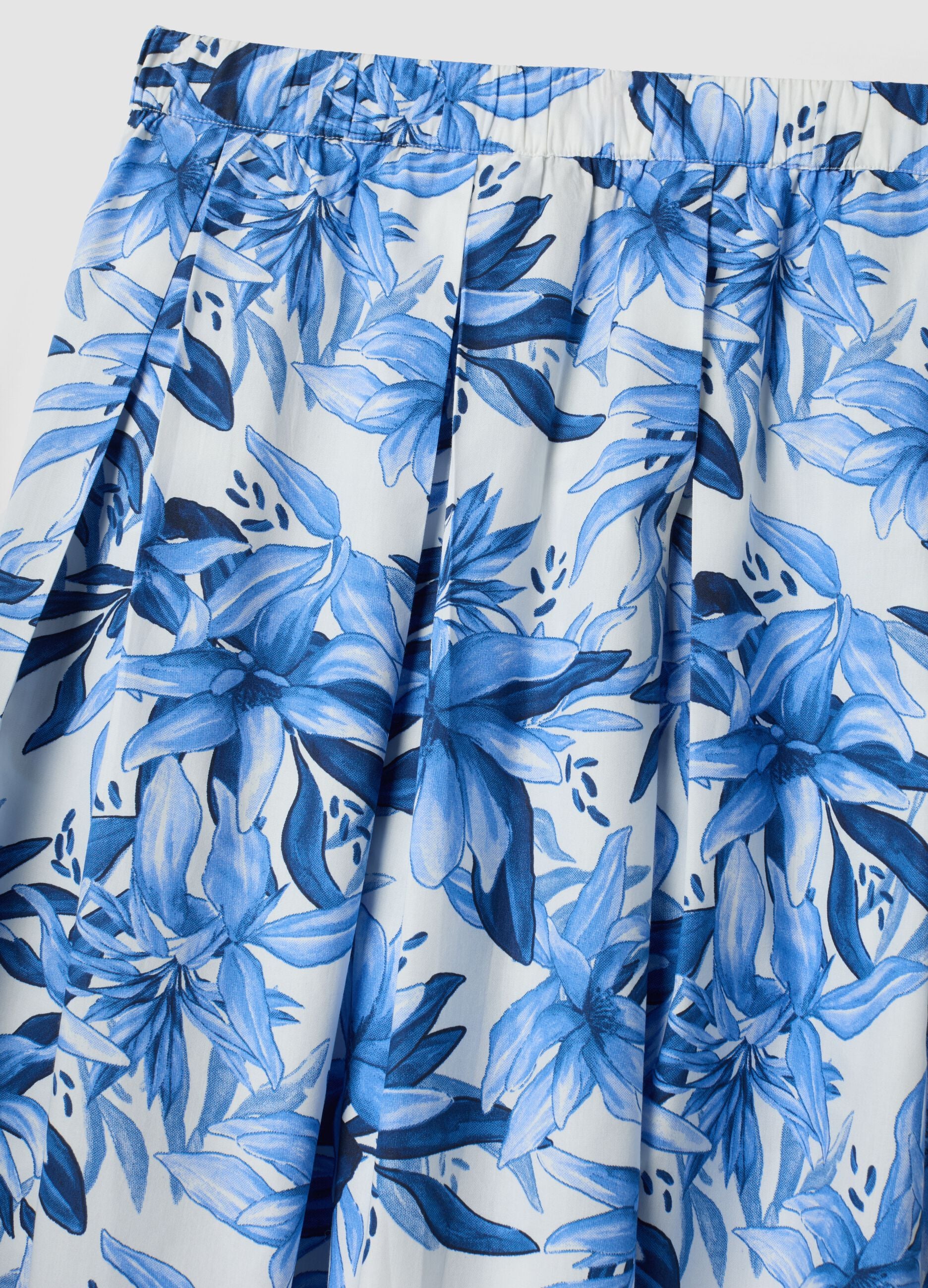 Blue and white cotton midi skirt with floral print