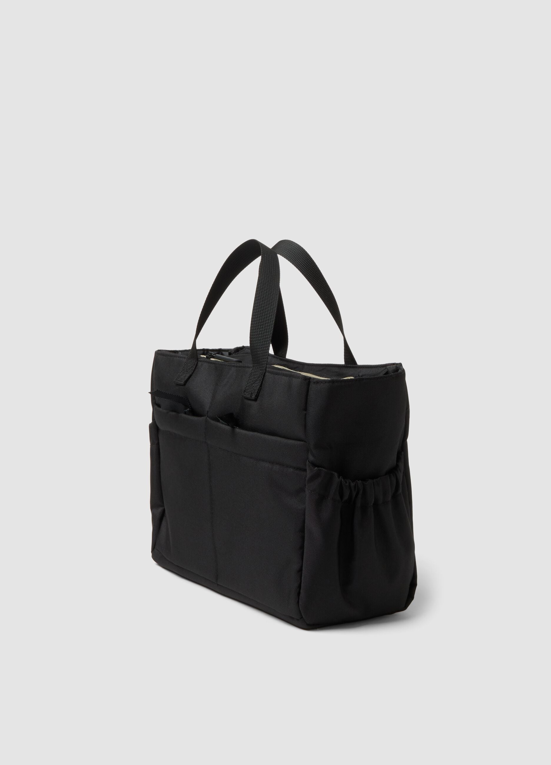 Black handbag with external pockets and double handles