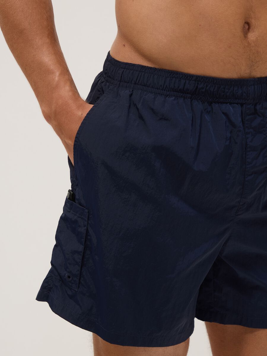 Blue swim shorts with elasticated waistband_3