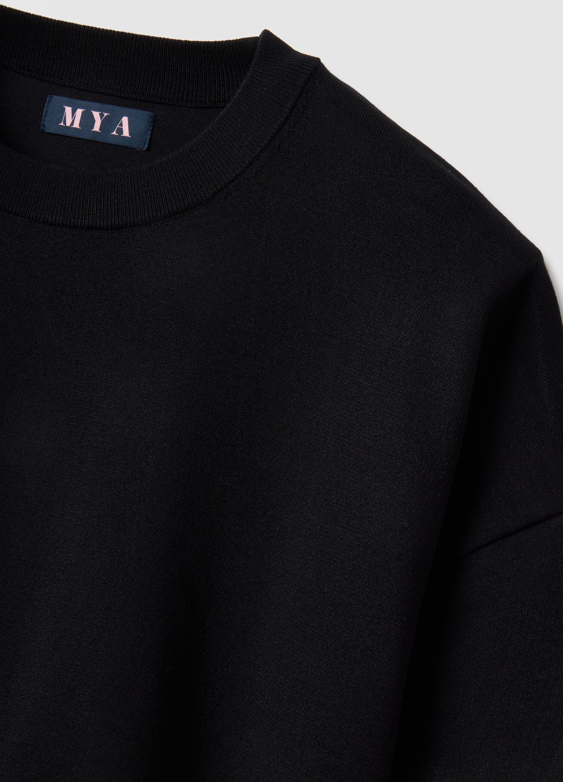 Black oversized crop top with round neckline