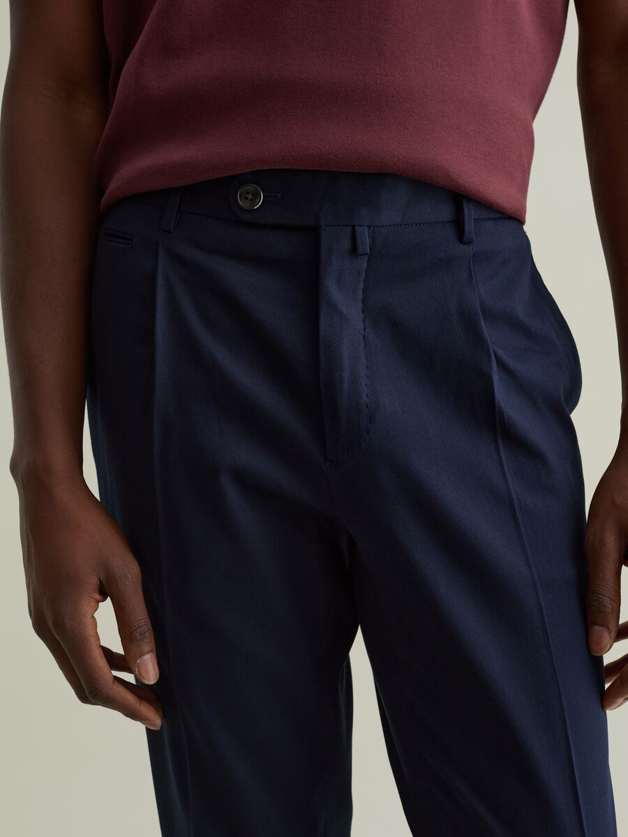 Contemporary chino trousers with darts_3