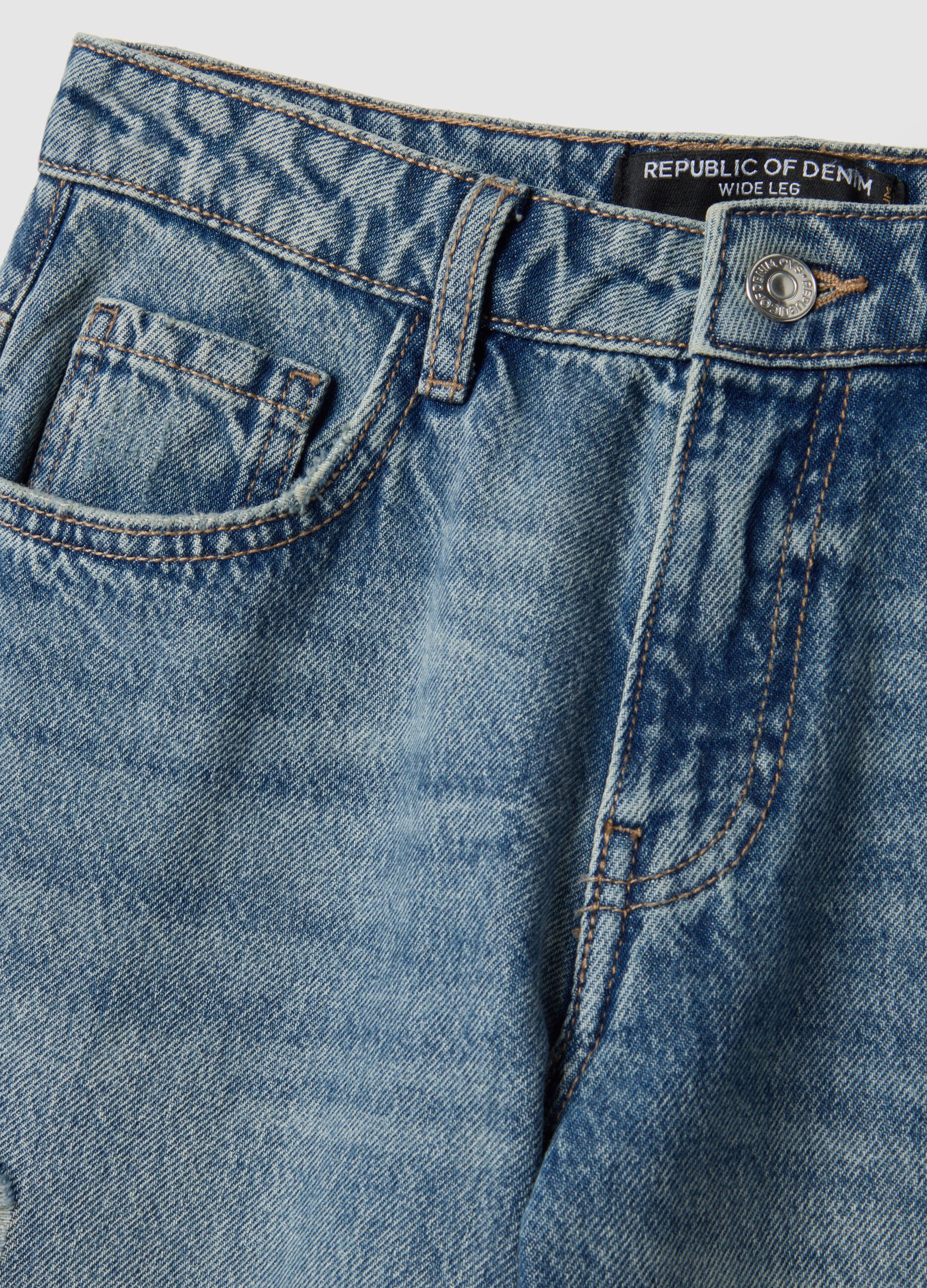 Wide leg blue cotton jeans with rips