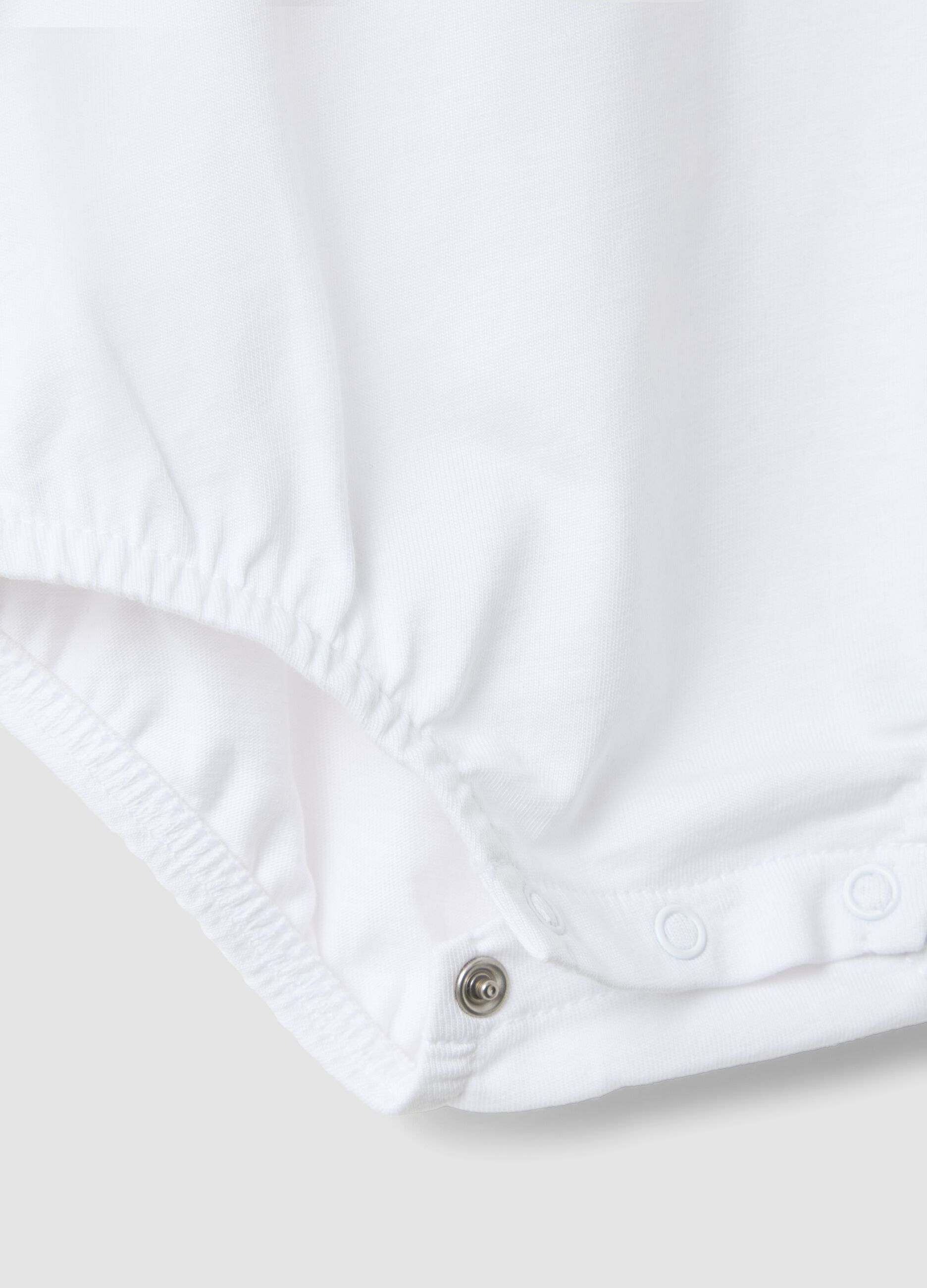 White organic cotton baby bodysuit with embroidery