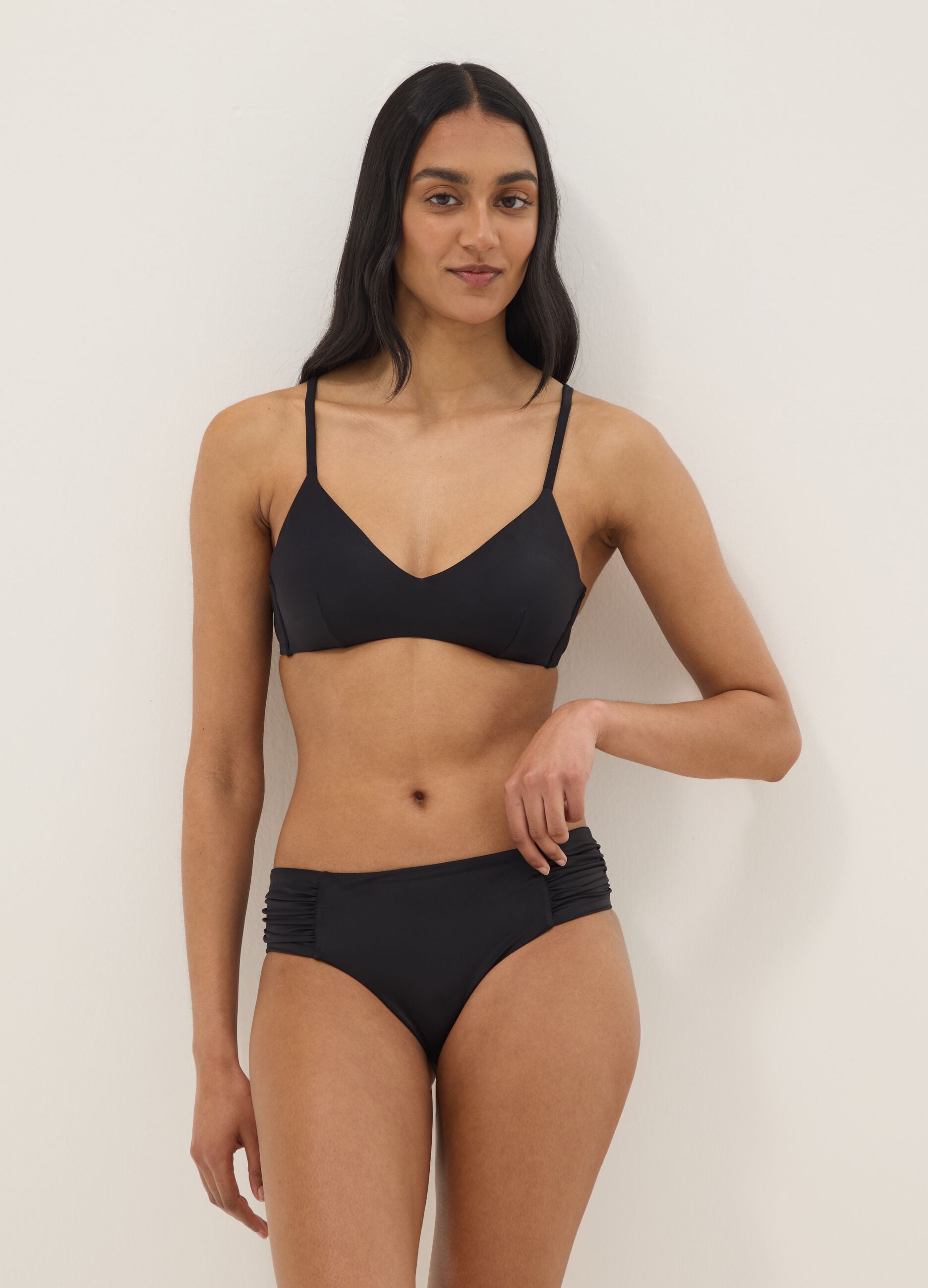 Black stretch swim briefs with side gathers