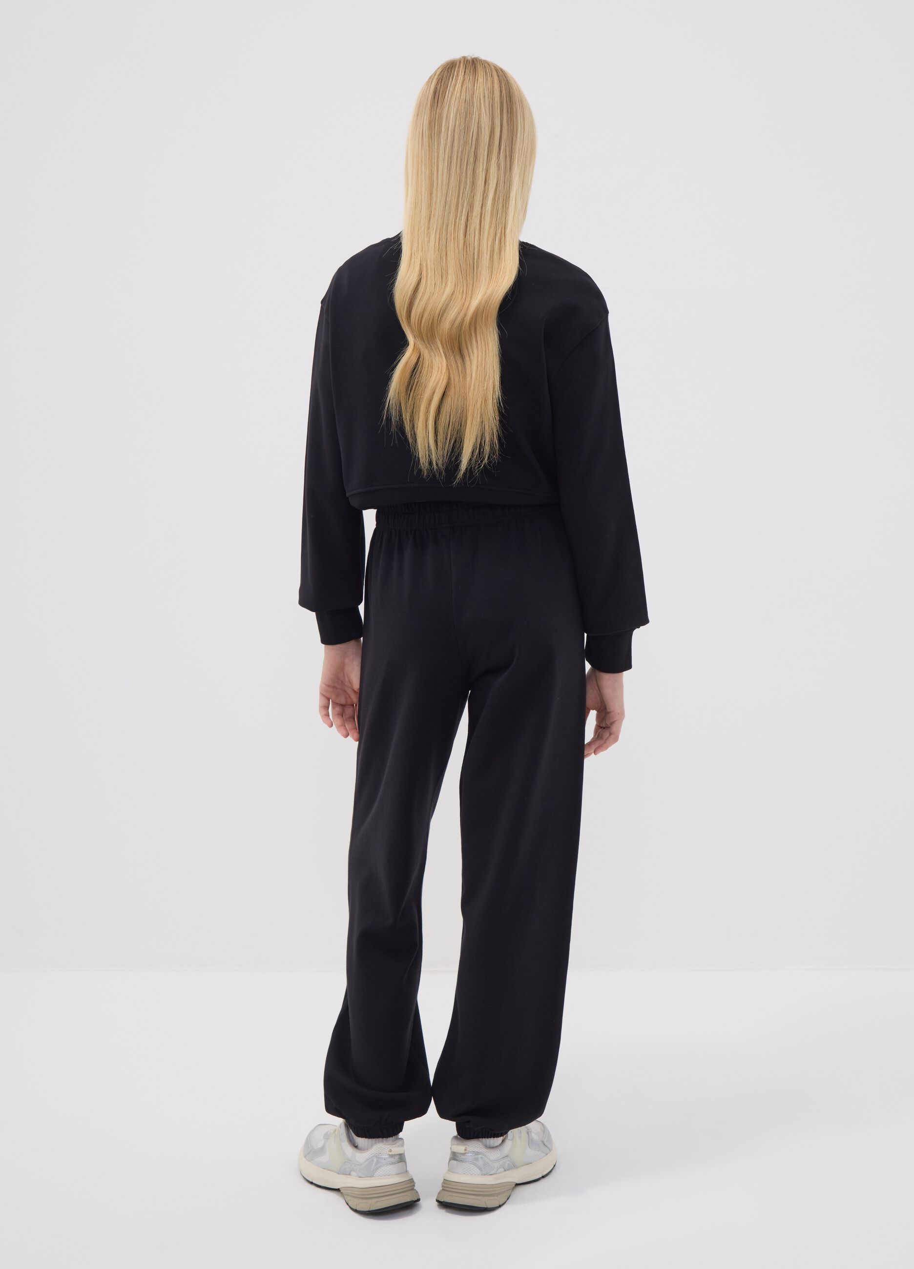Black jogger trousers in organic cotton and viscose blend for girls