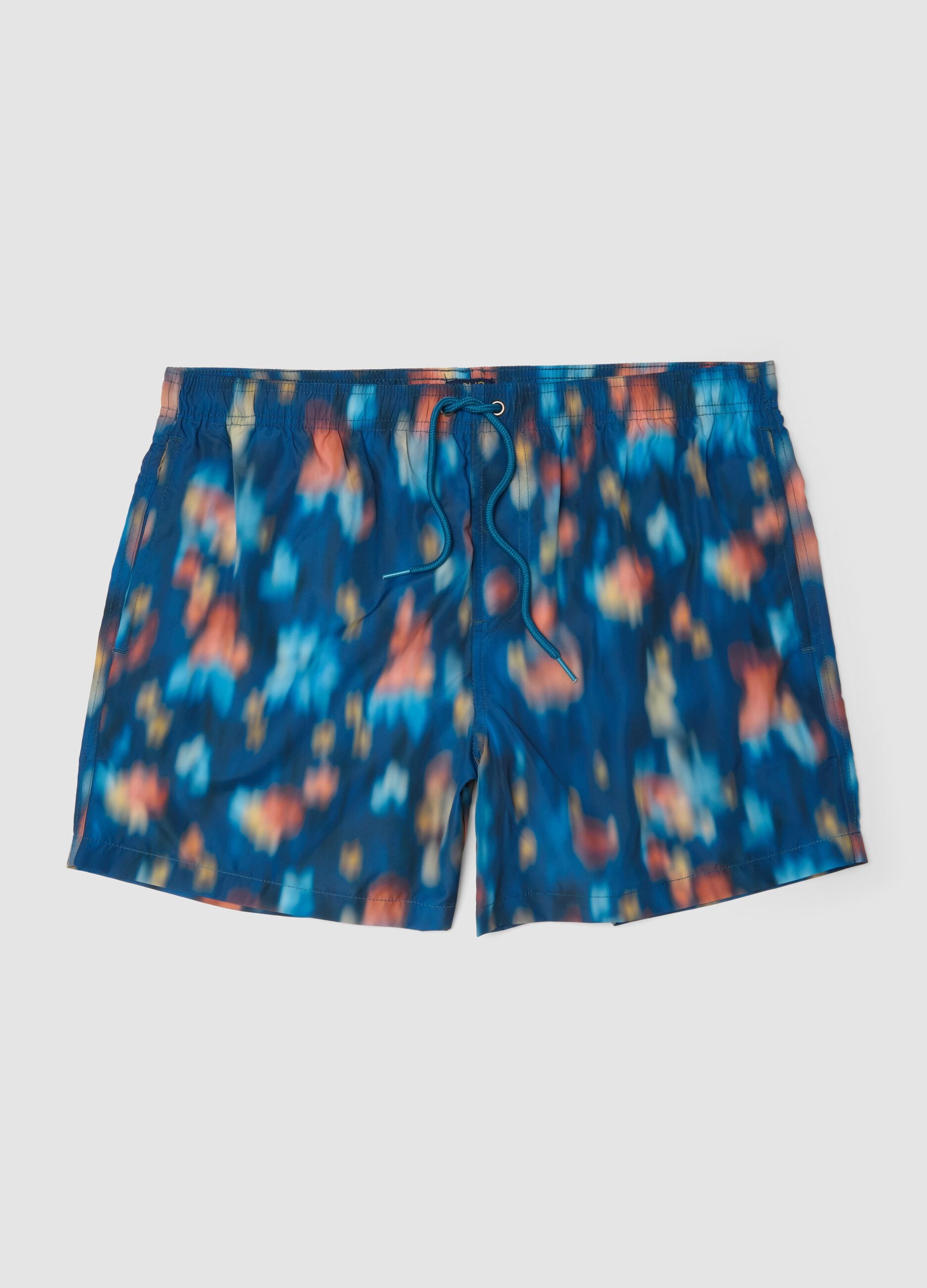 Blue boxer swim shorts with multicolour gradient print