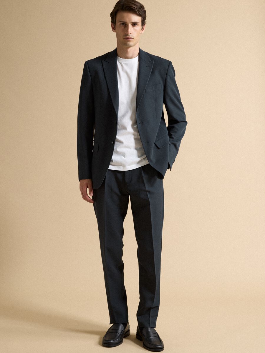 Pantaloni formali blu in twill di viscosa elasticizzata slim fit_0