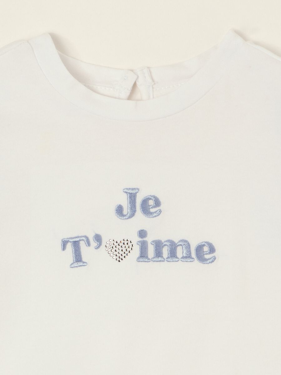 T-shirt bianca in cotone elasticizzato con volant_1