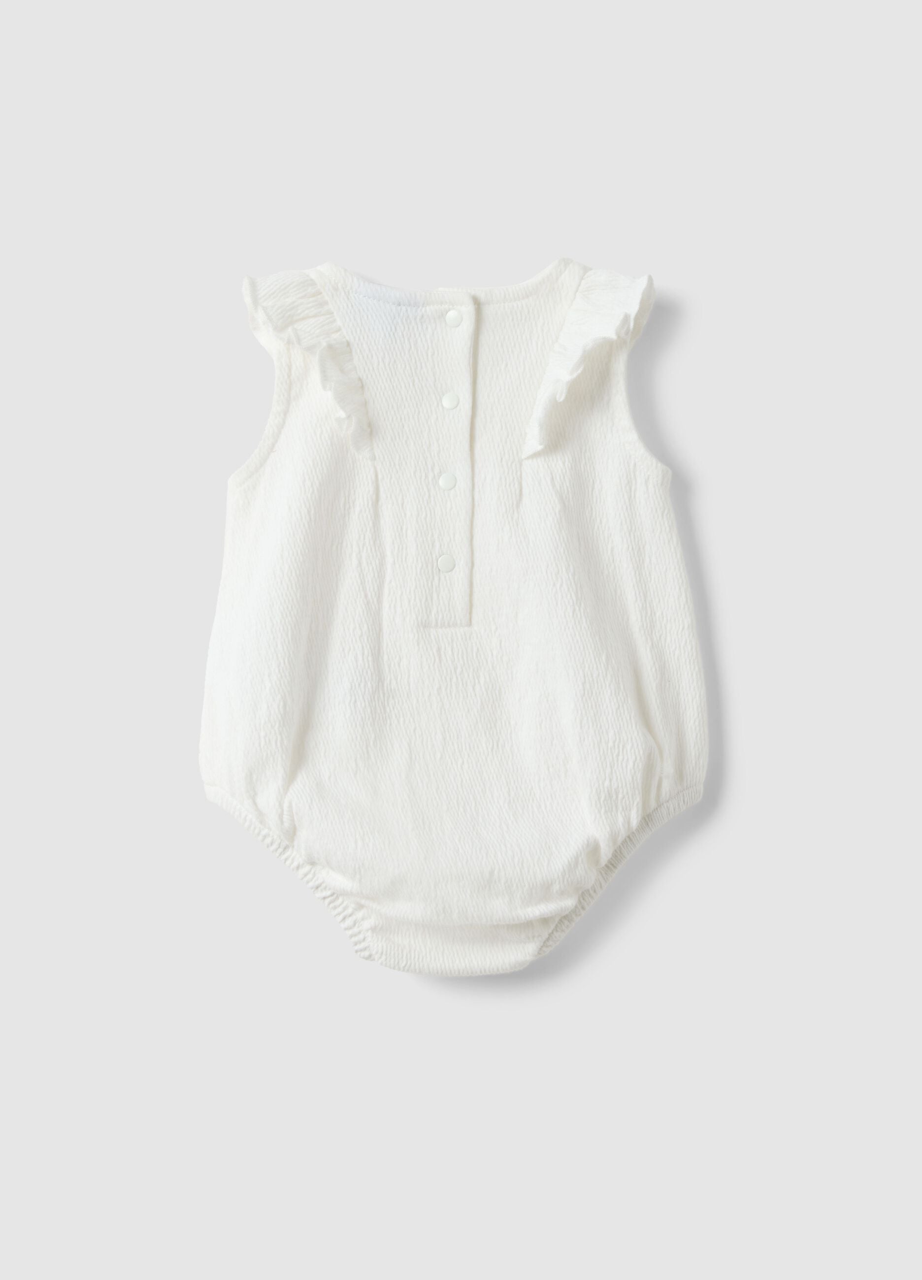 White baby body with ruffles in organic cotton blend