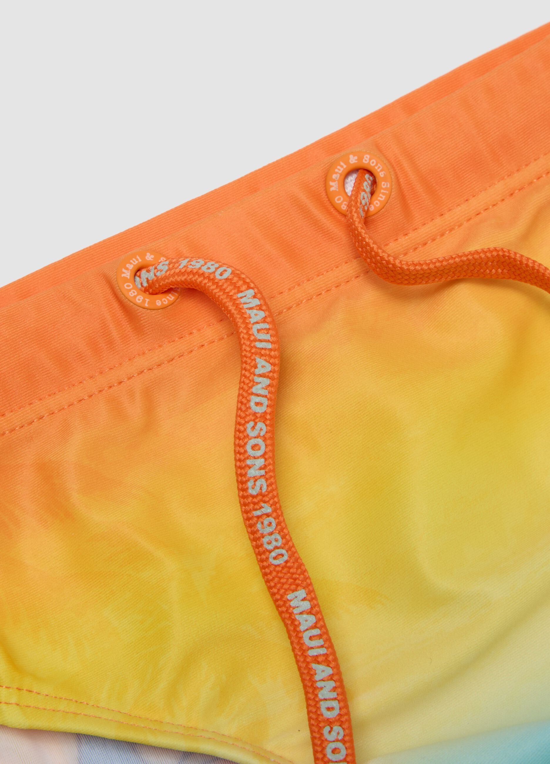 Orange and blue stretch swim briefs for boys