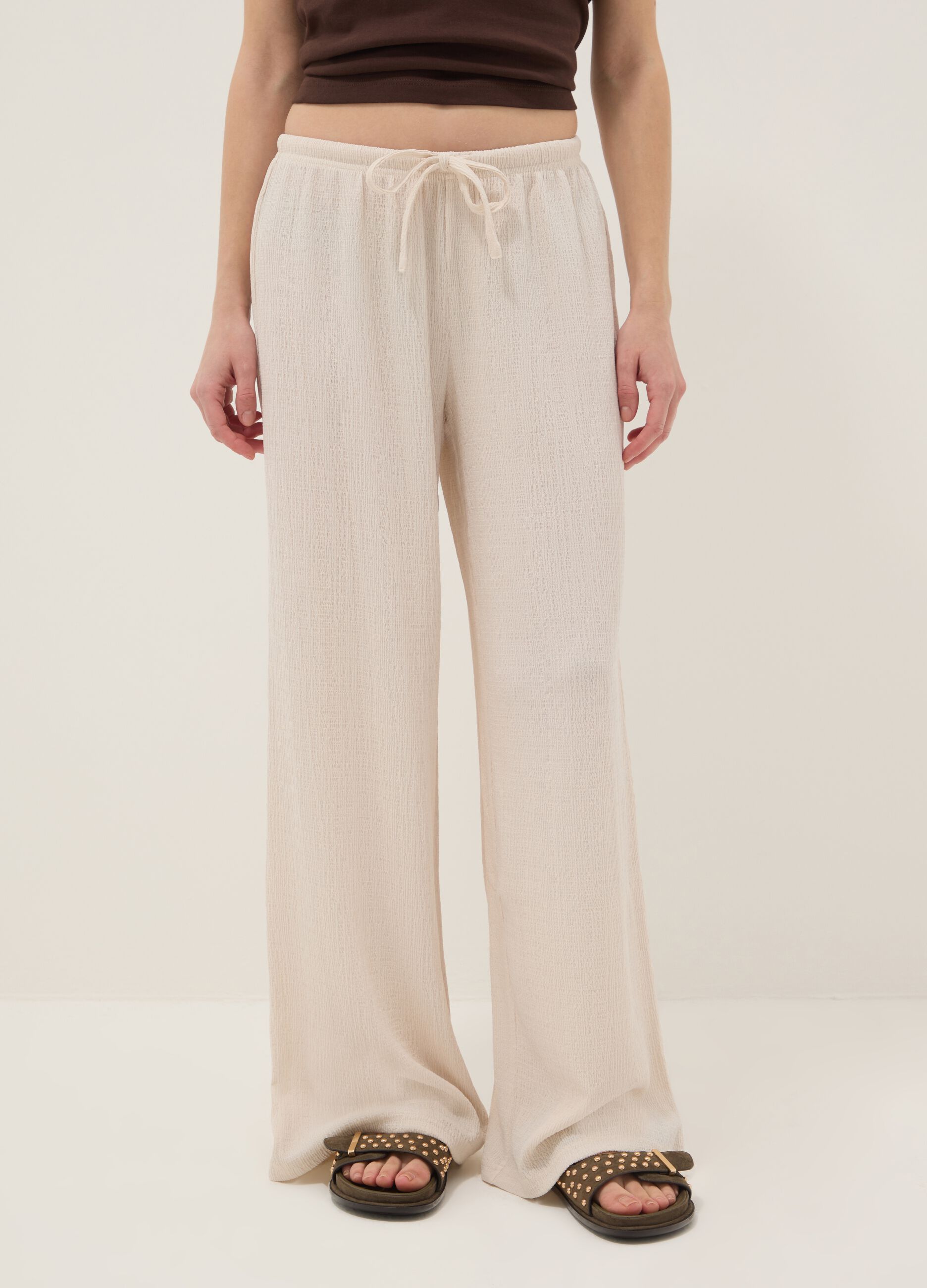 Beige wide leg jogger trousers