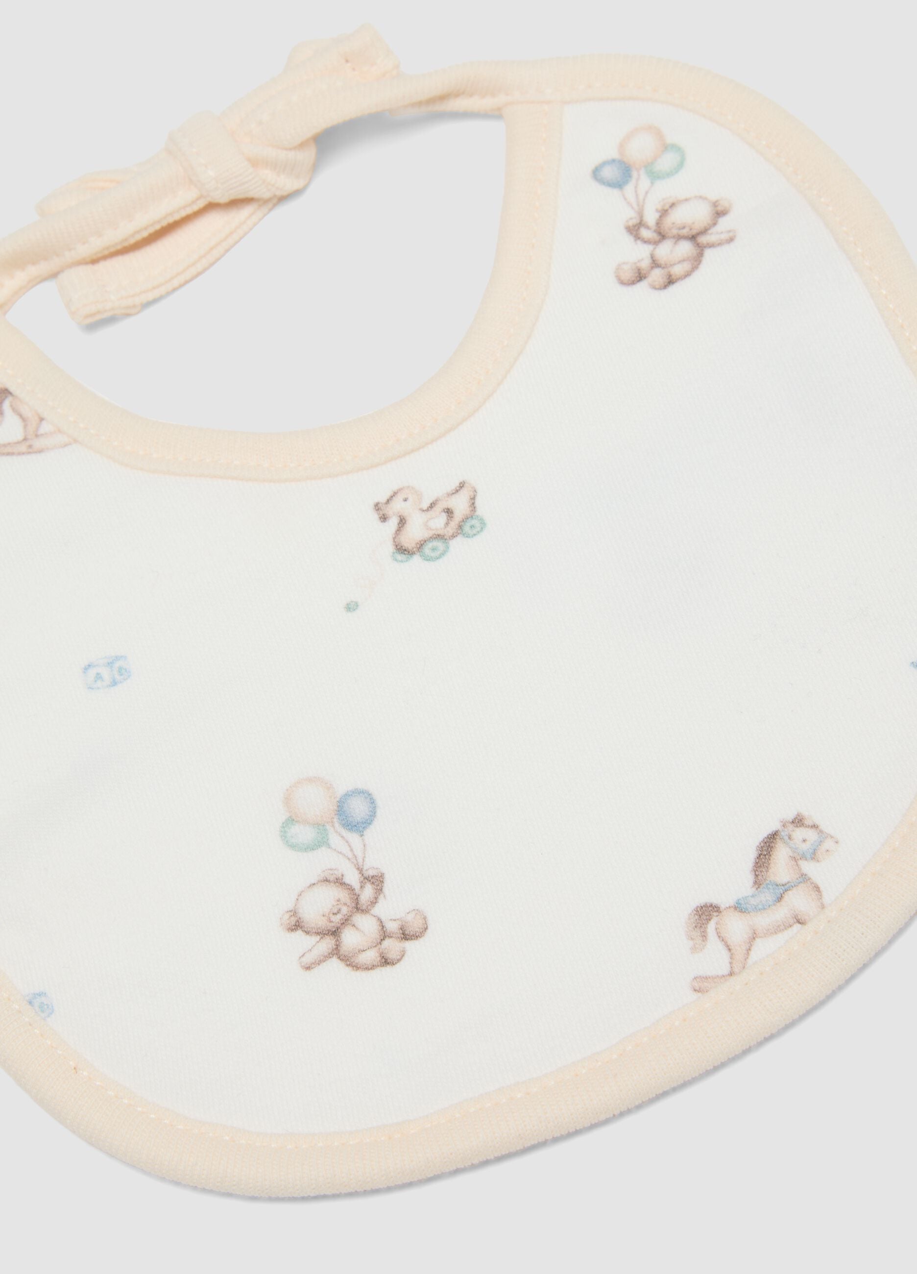 Two-pack of blue and yellow baby bibs in pure organic cotton with prints