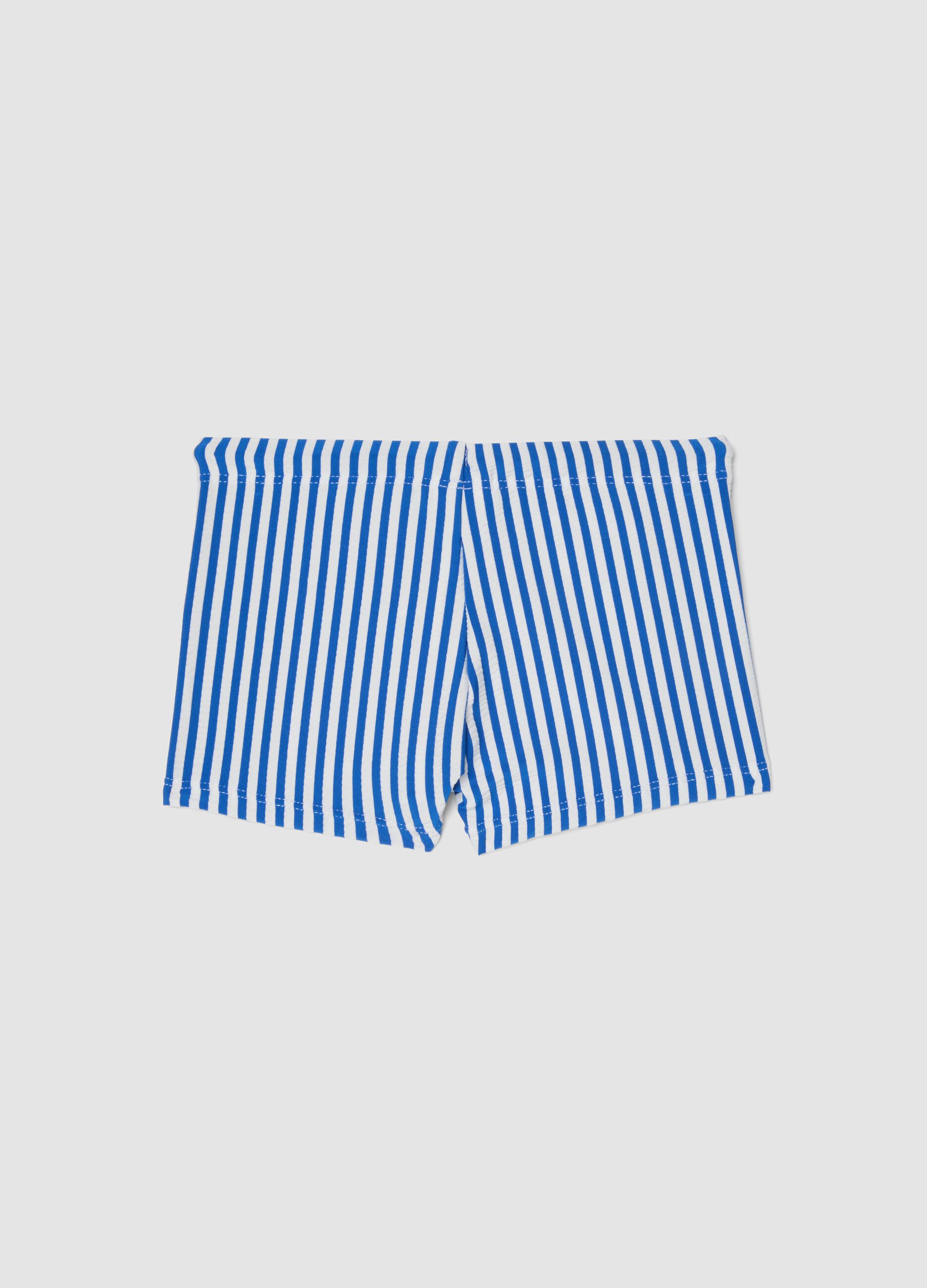 Blue and white stretch swim trunks
