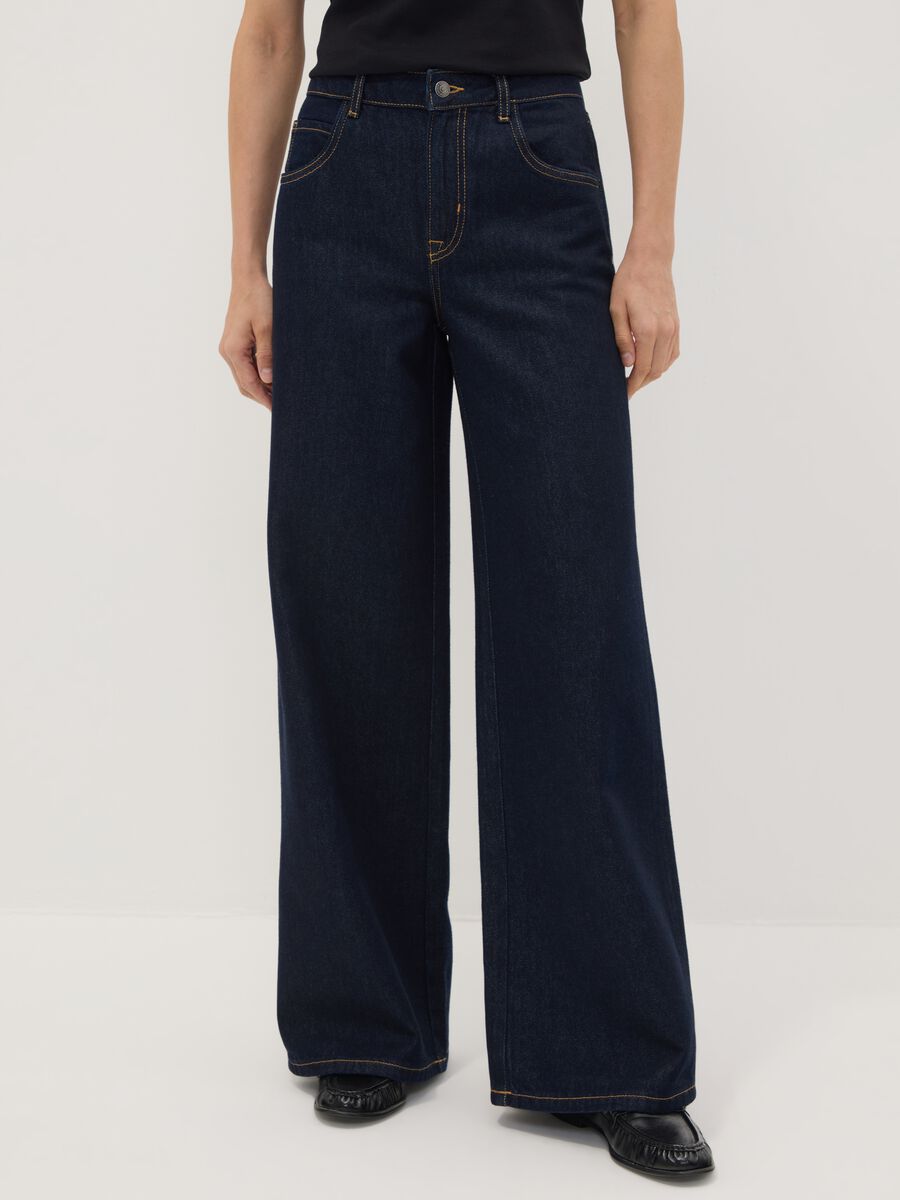 Blue denim bootcut jeans in cotton and lyocell blend_1