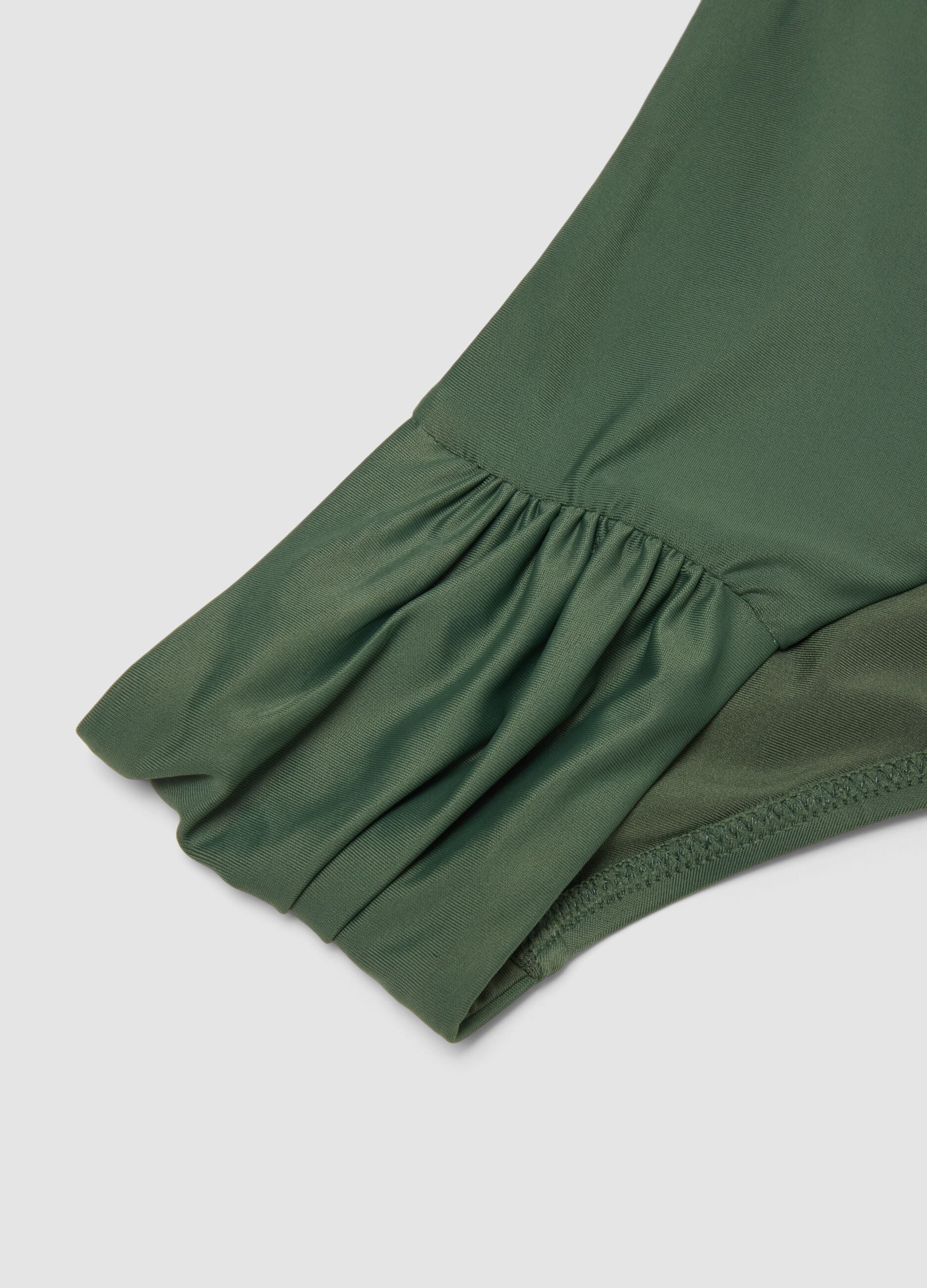 Green stretch swim briefs with side ruching