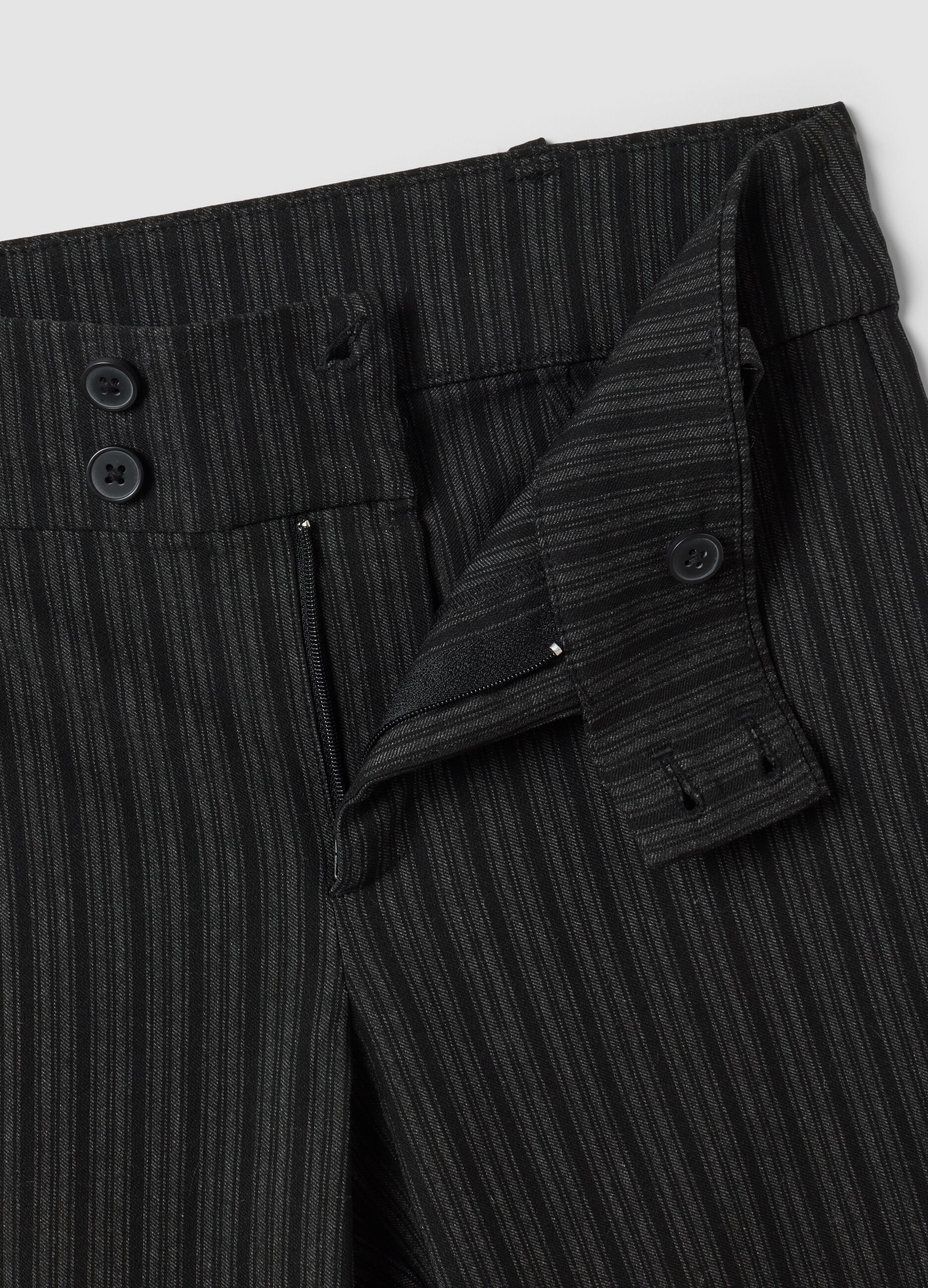 Black flared pinstripe trousers in stretch viscose