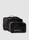 Set of three black travel organisers with pink zip_0