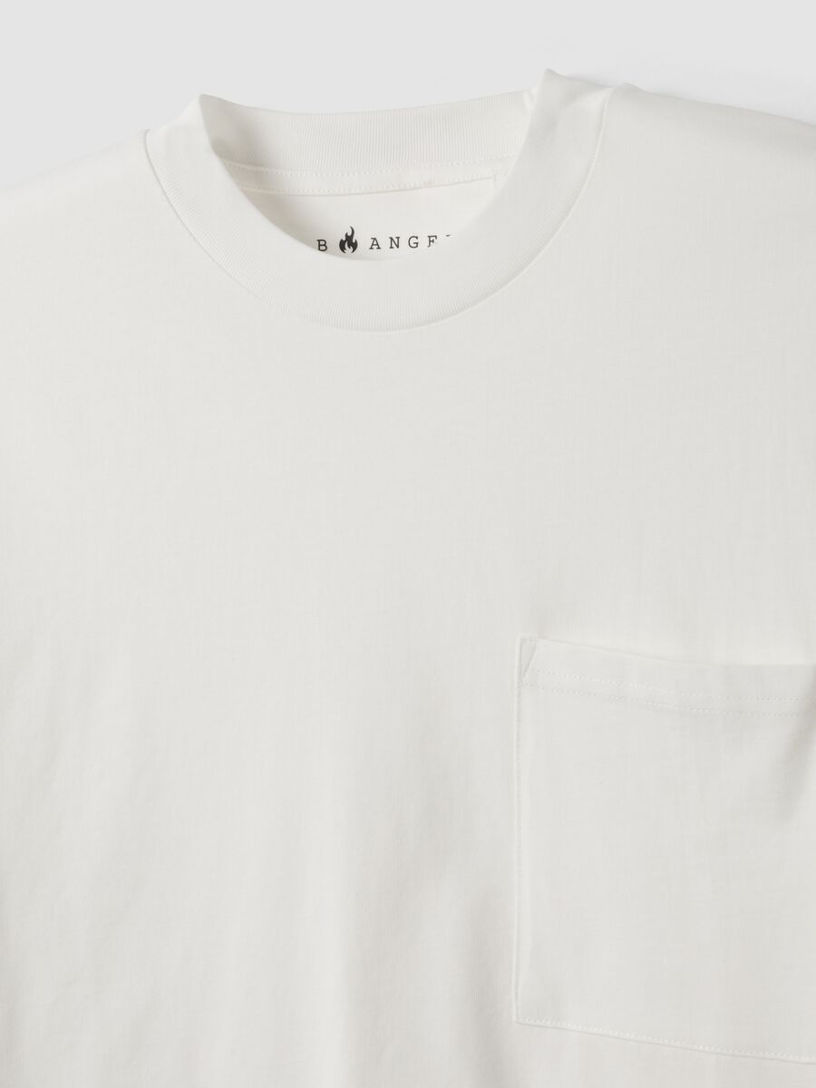 T-shirt bianca in puro cotone girocollo con taschino boxy fit_1