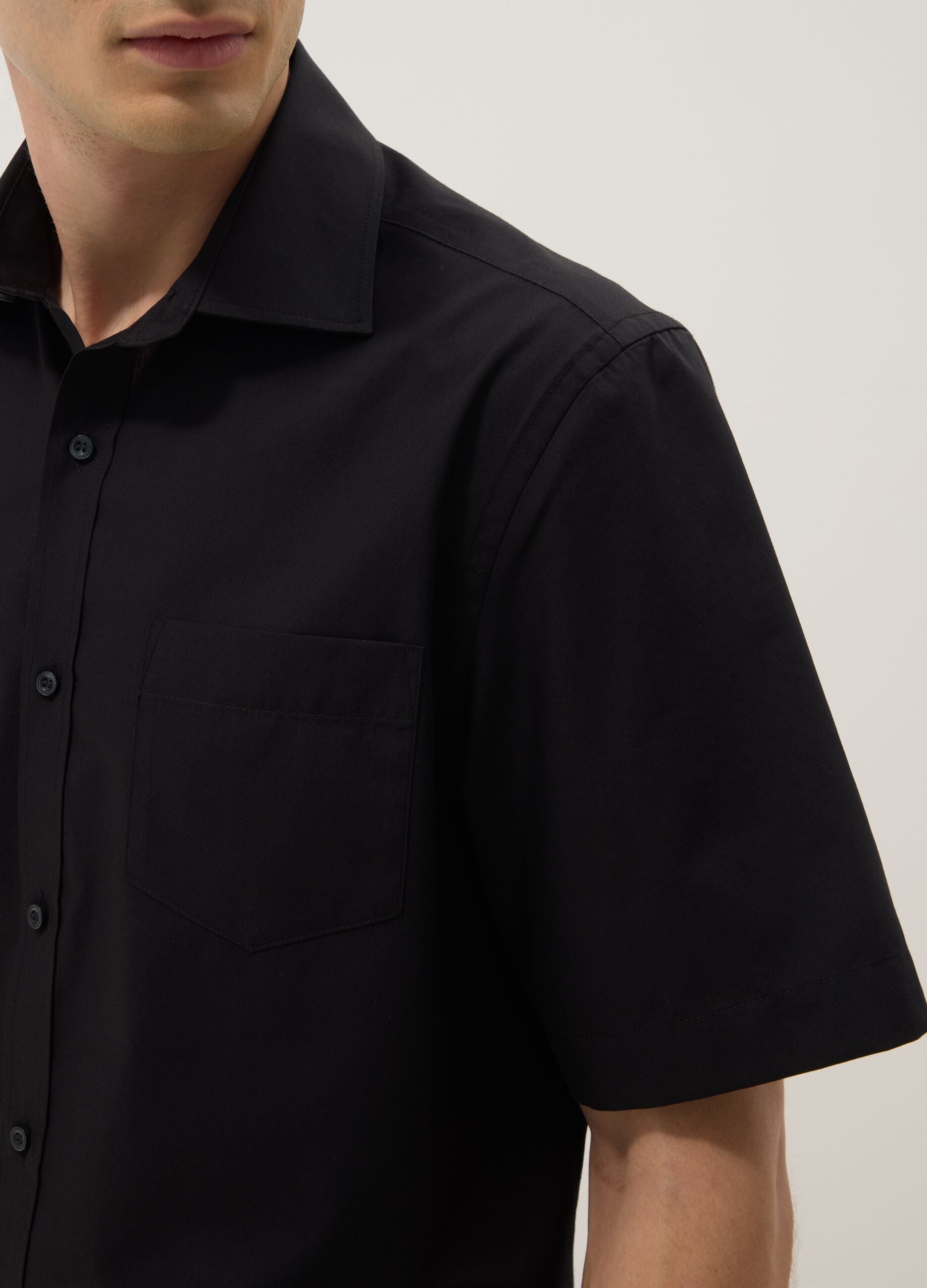 Black short-sleeve shirt with classic collar