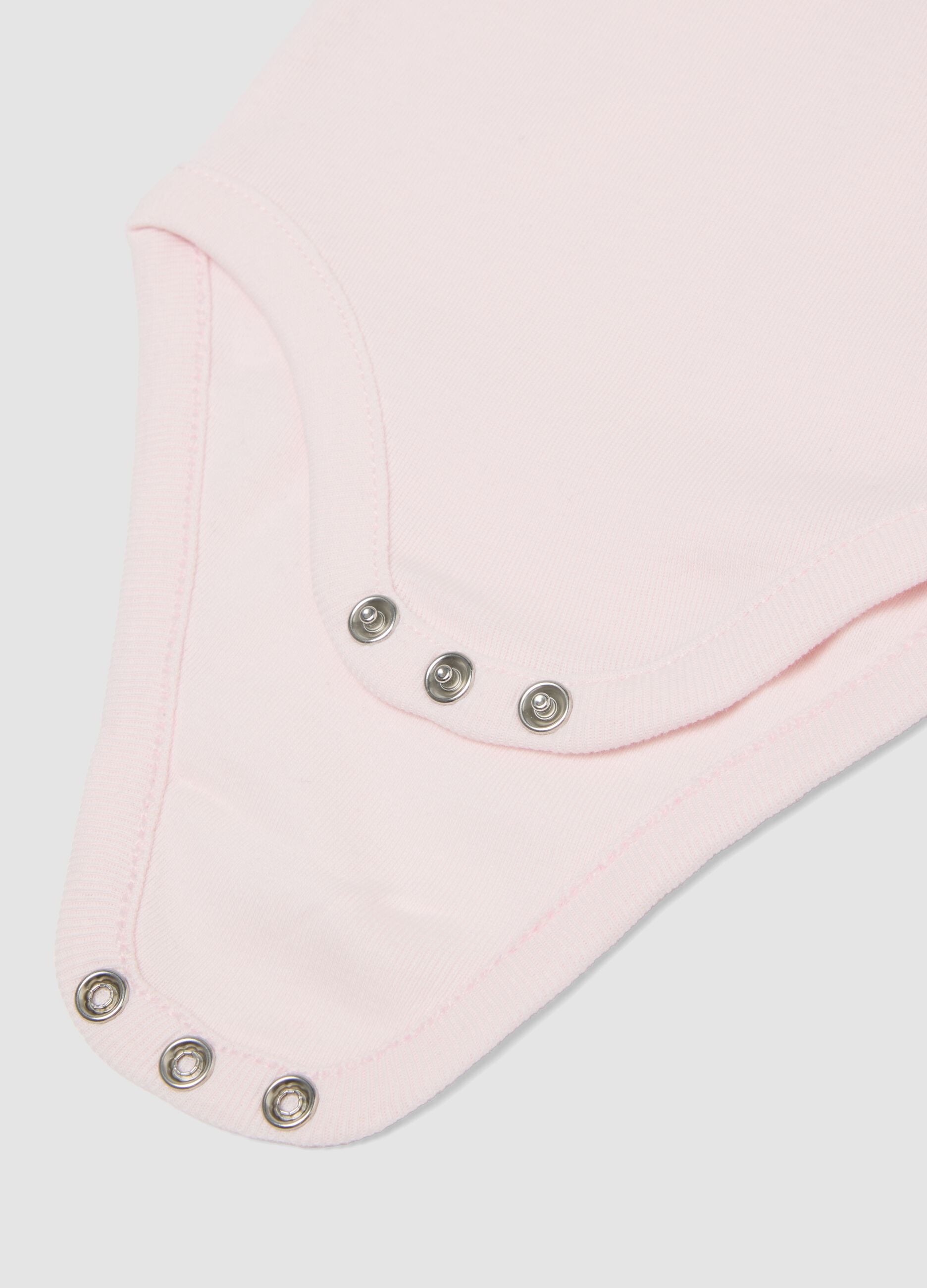 2-pack of pink and white organic cotton short-sleeve bodysuits for baby girls