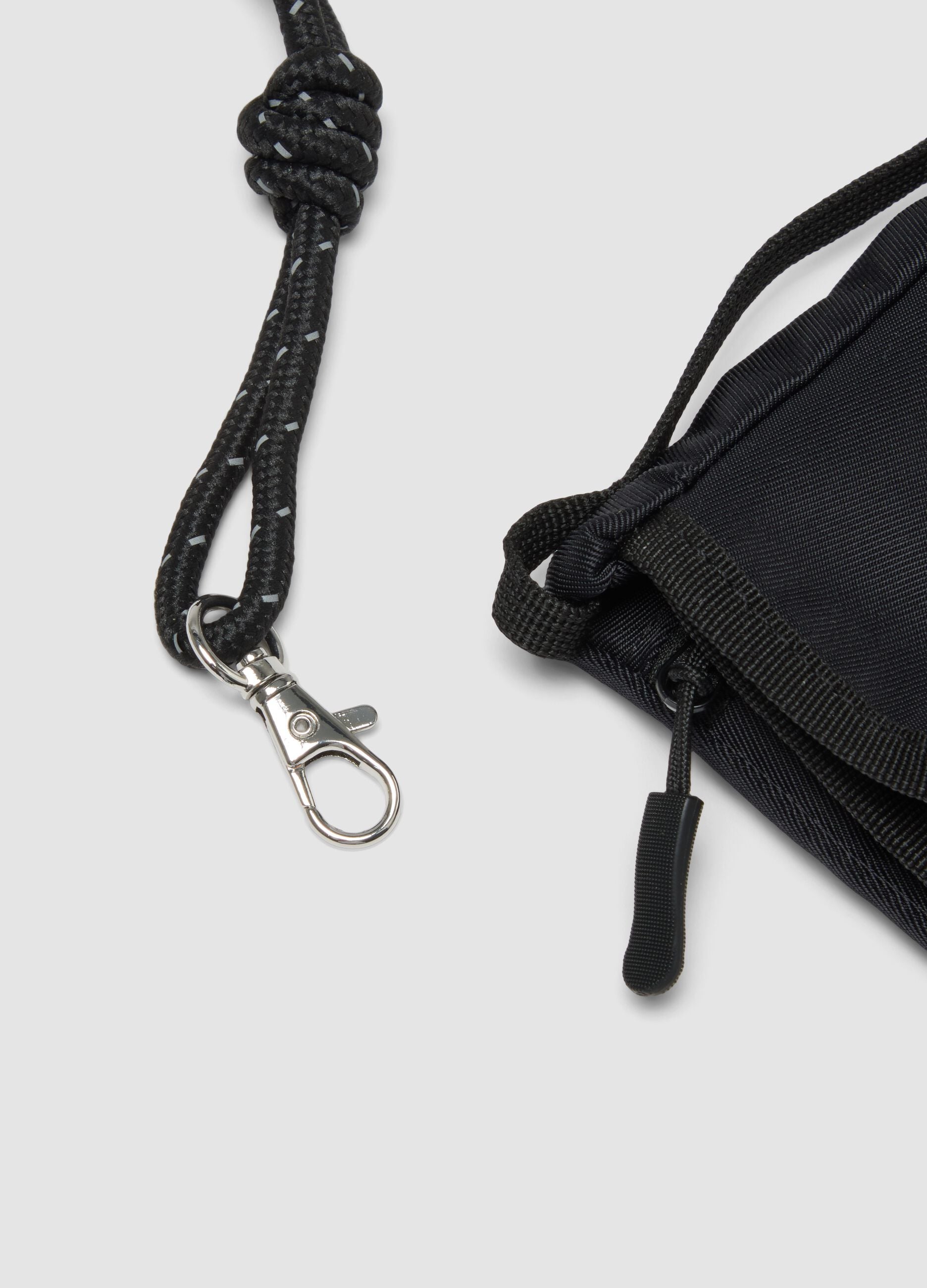 Black crossbody bag with adjustable drawcord strap