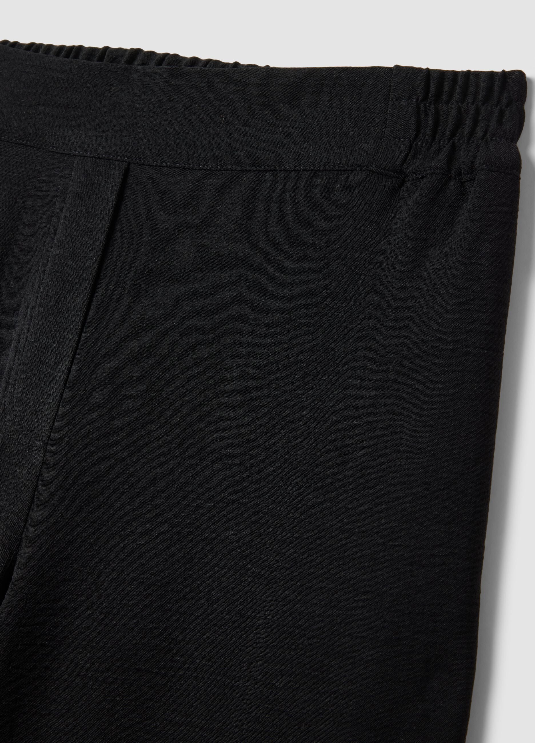 Pantaloni neri con vita elasticizzata wide leg