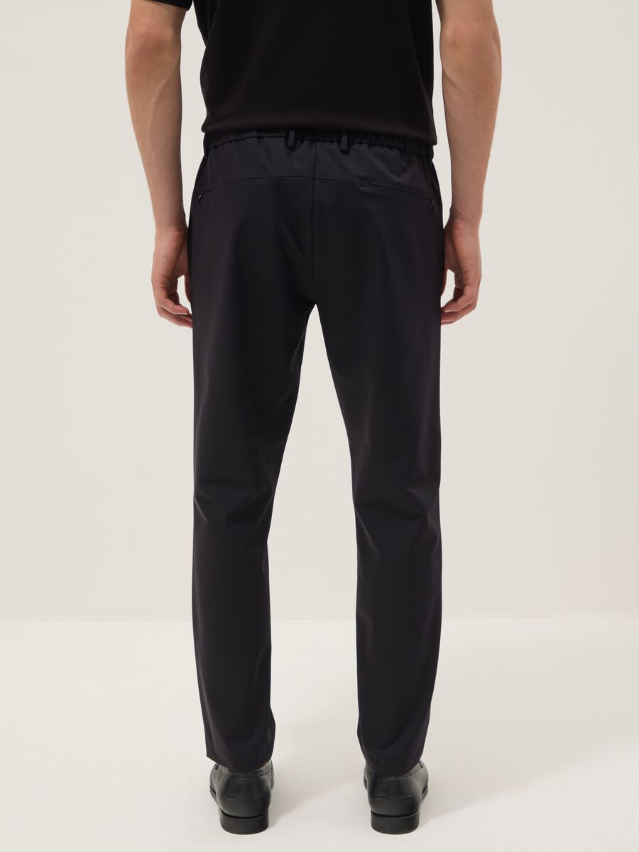 Black stretch carrot-fit chino trousers_2