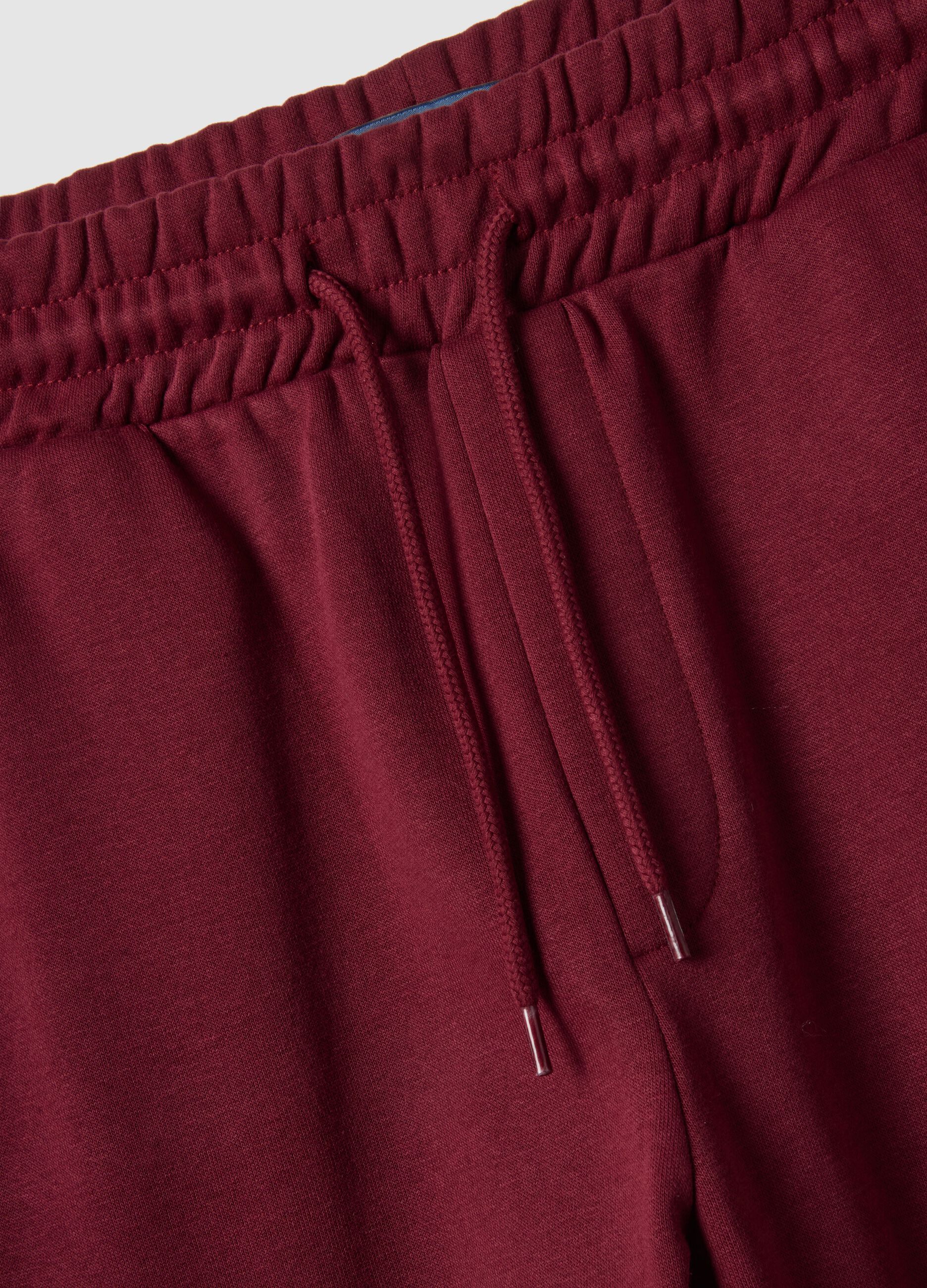 Red regular fit jogger trousers in cotton blend