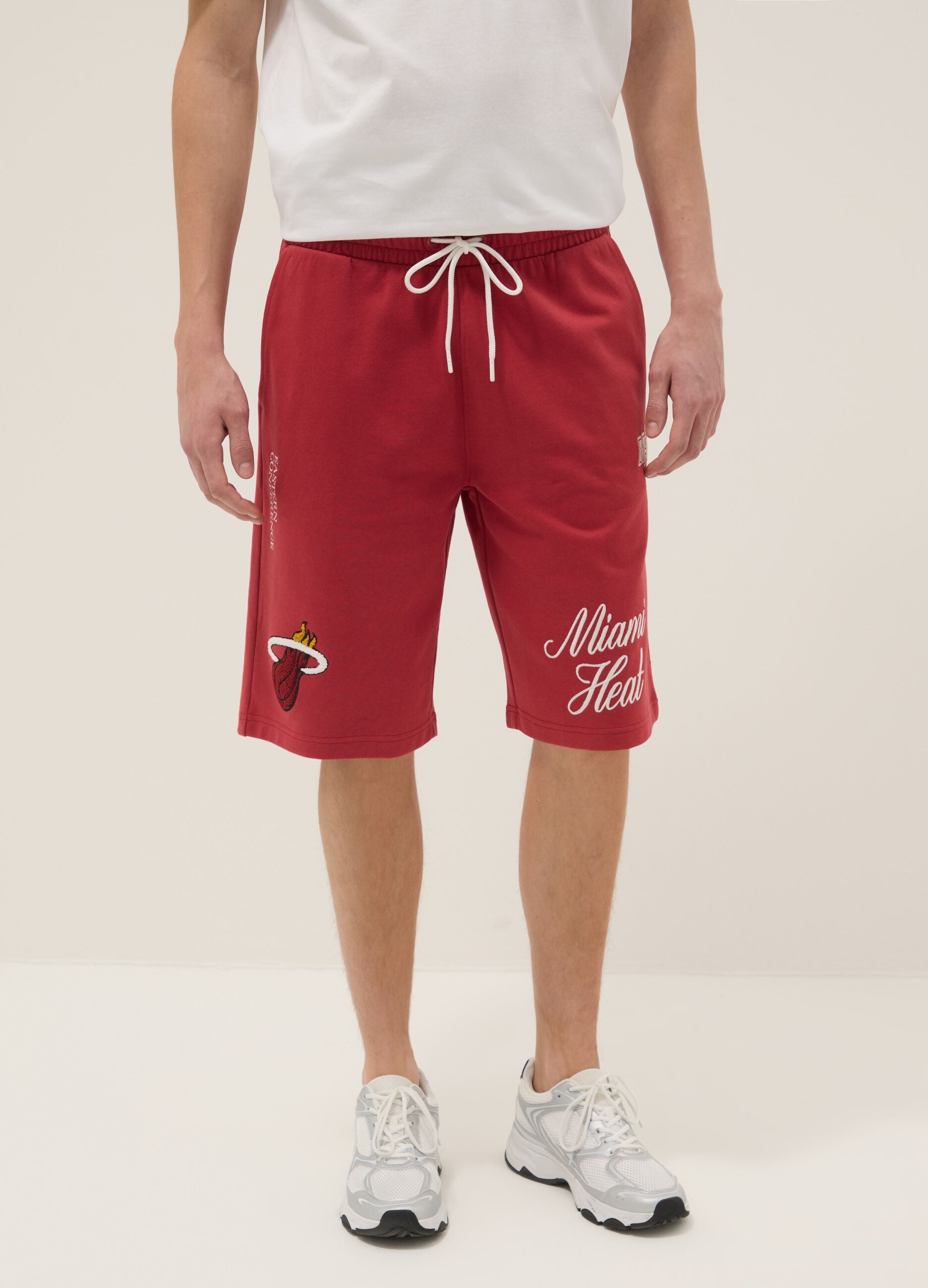Red cotton-blend sports shorts with Miami Heat logo