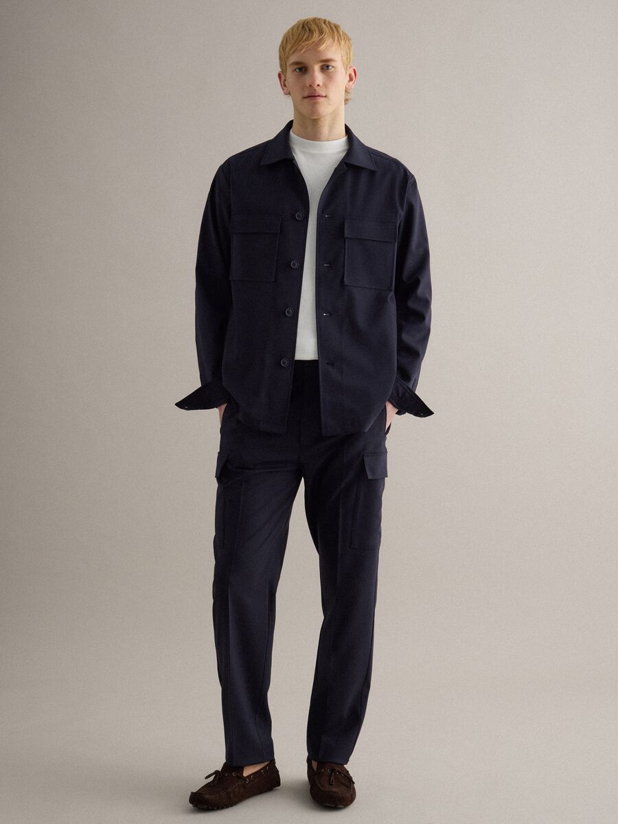 Light blue regular fit jacket with buttons and front pockets_2