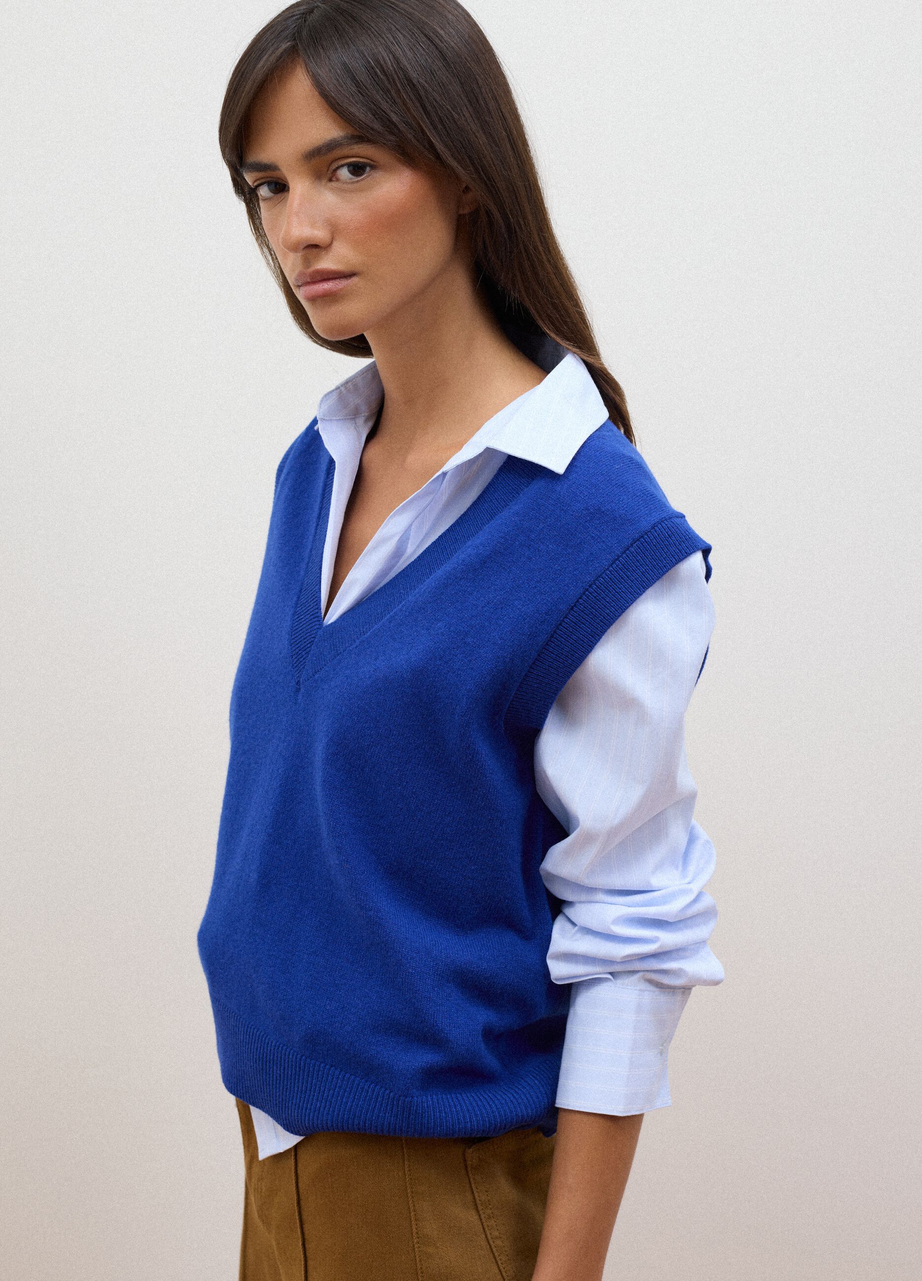 Blue pure wool gilet with deep V-neck
