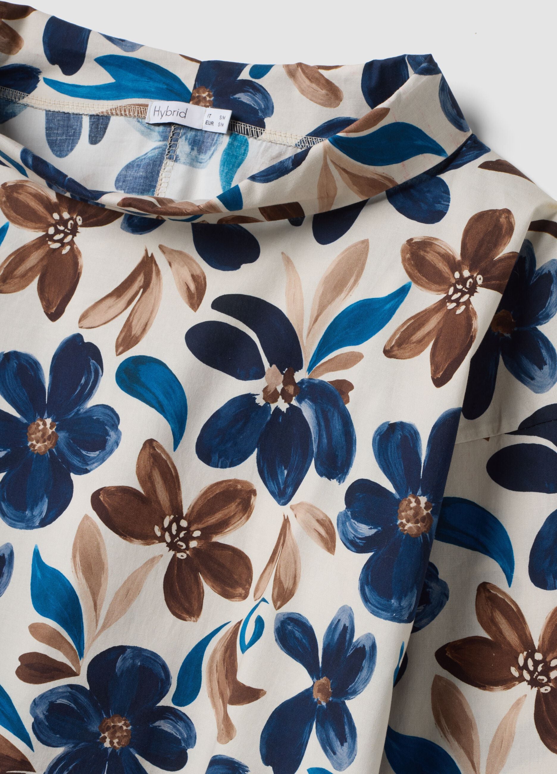 Blusa bianca in cotone elasticizzato con fantasia floreale regular fit