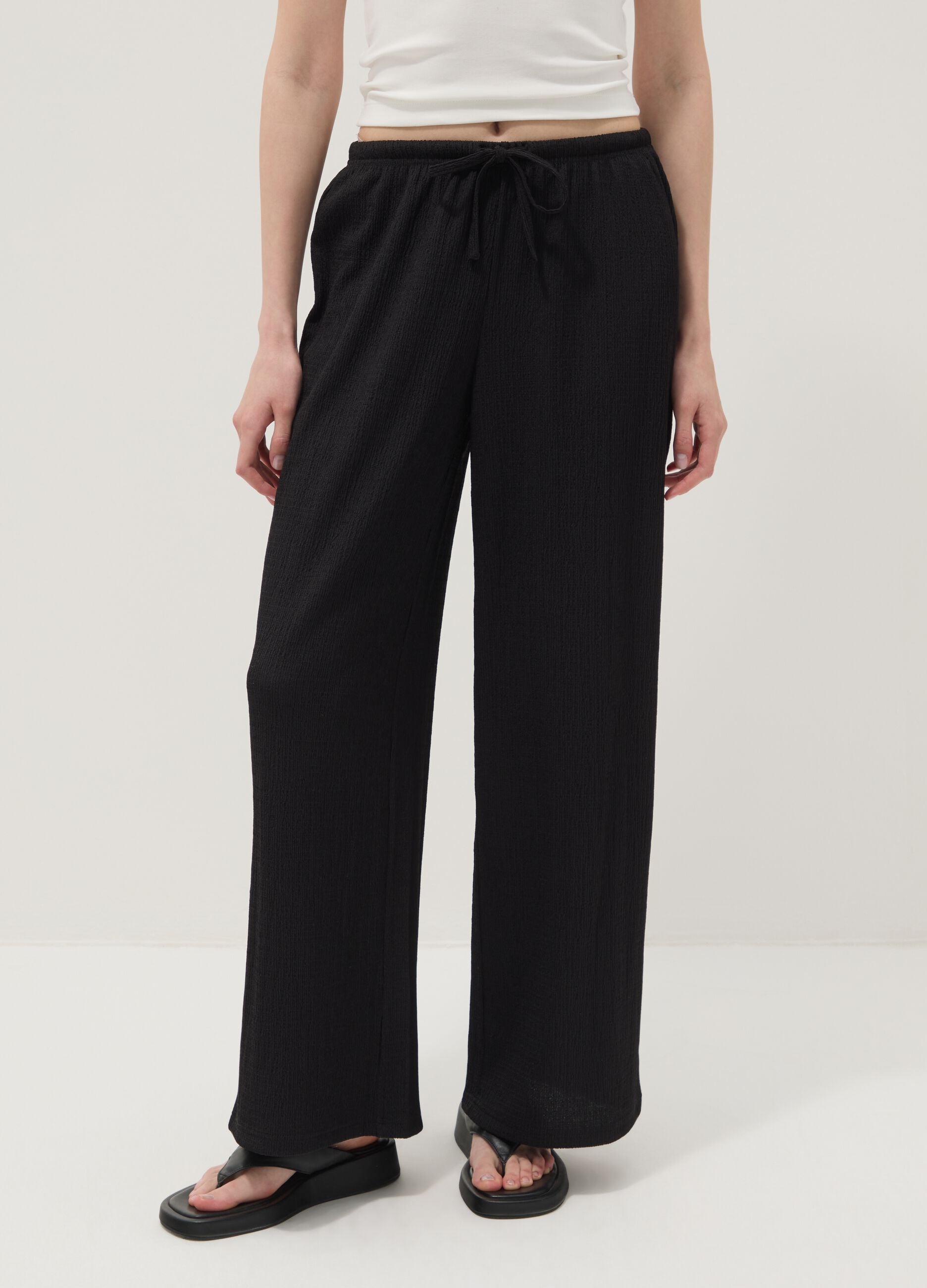 Black wide-leg jogger trousers
