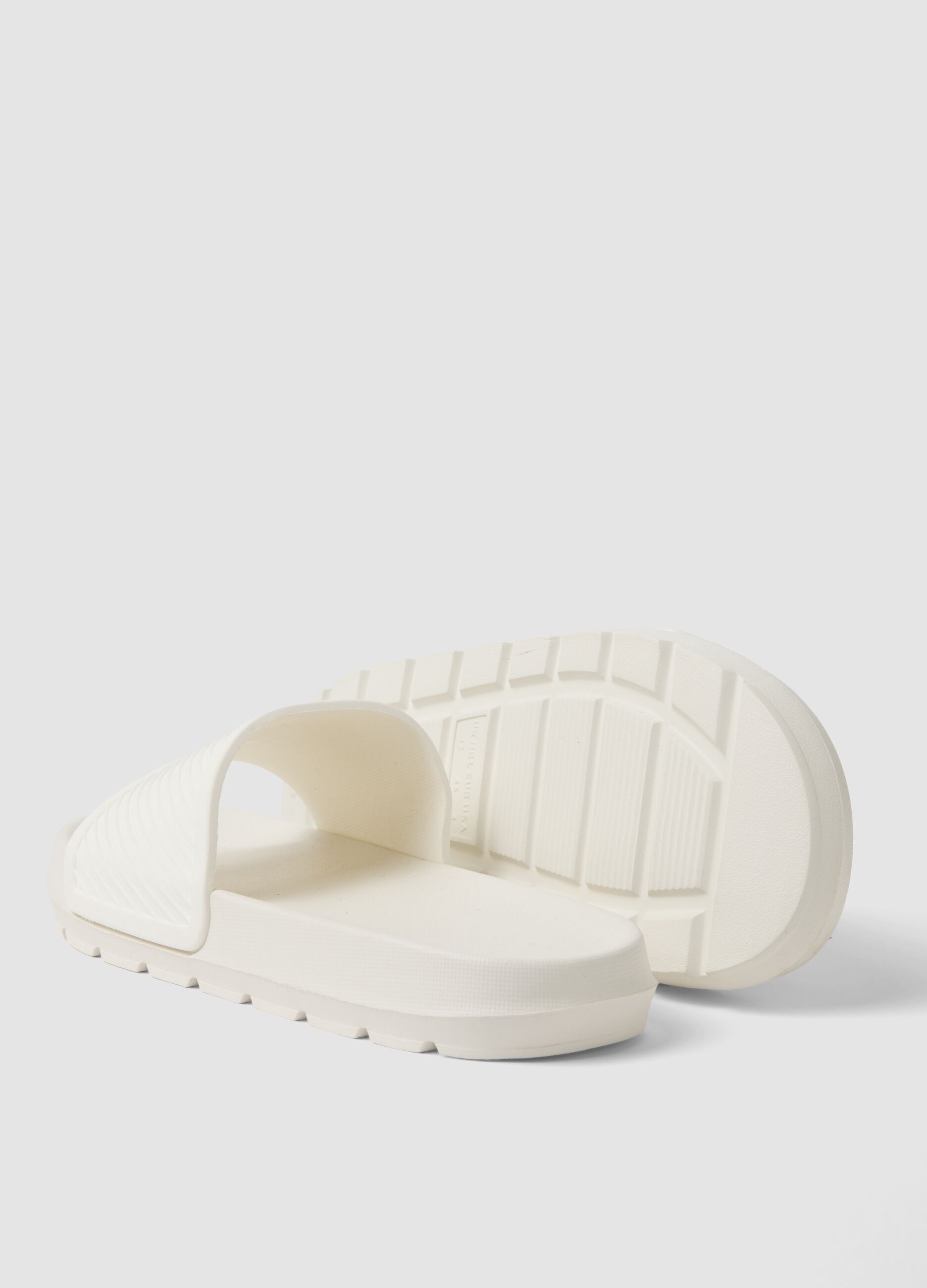 White slide sandals with wide strap
