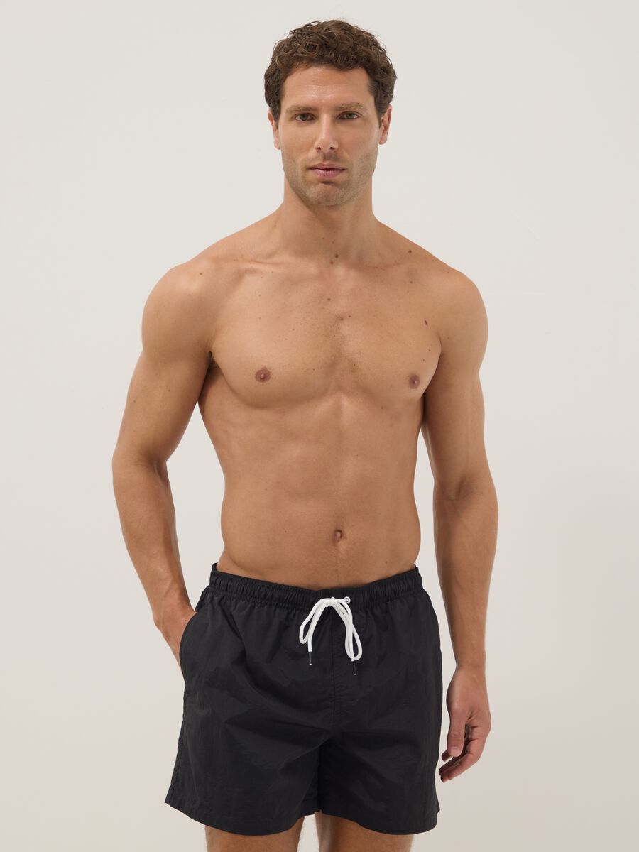 Black regular-fit swim shorts with drawstring_0