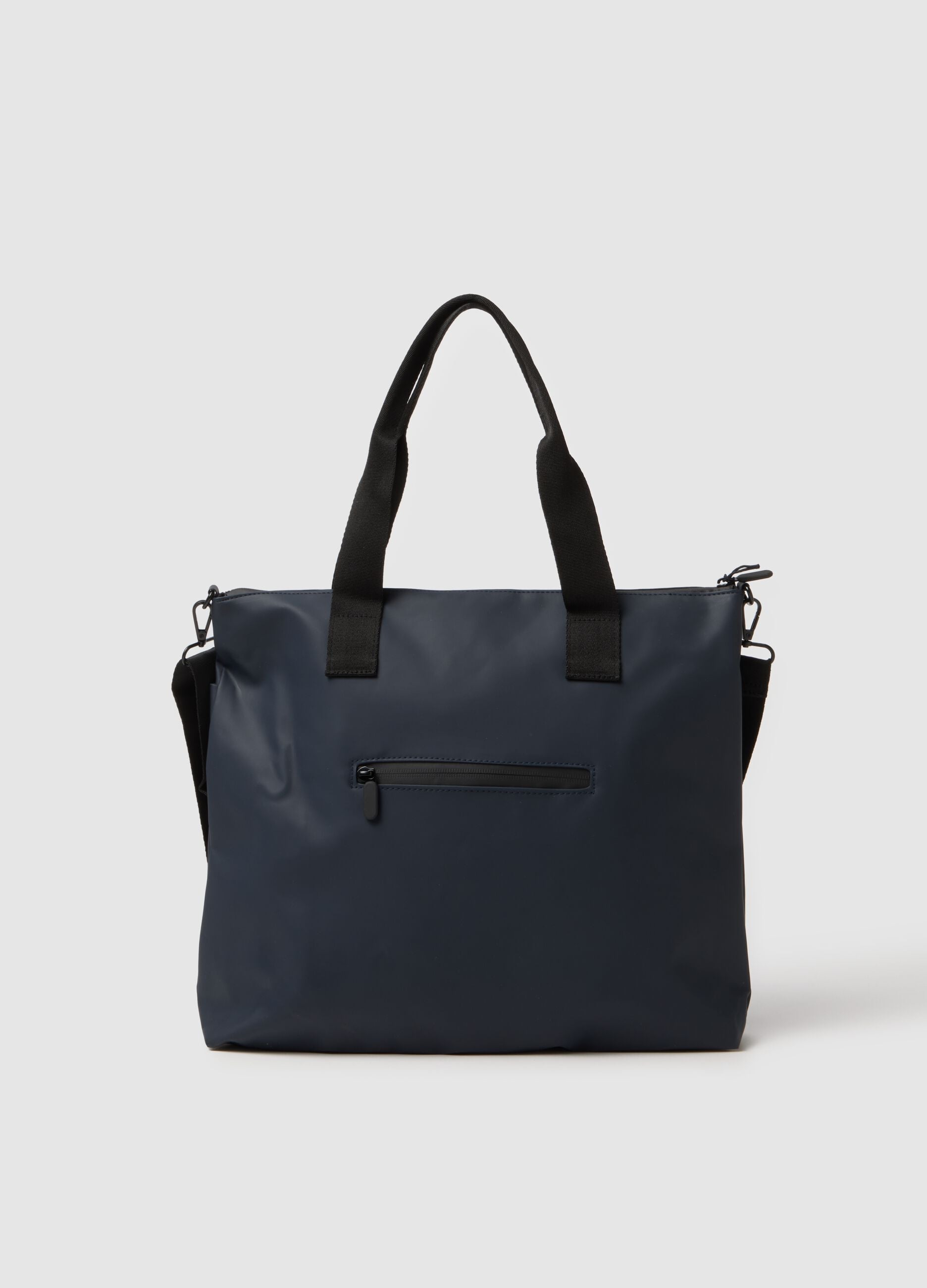 Blue shopper bag with multiple compartments and adjustable shoulder strap