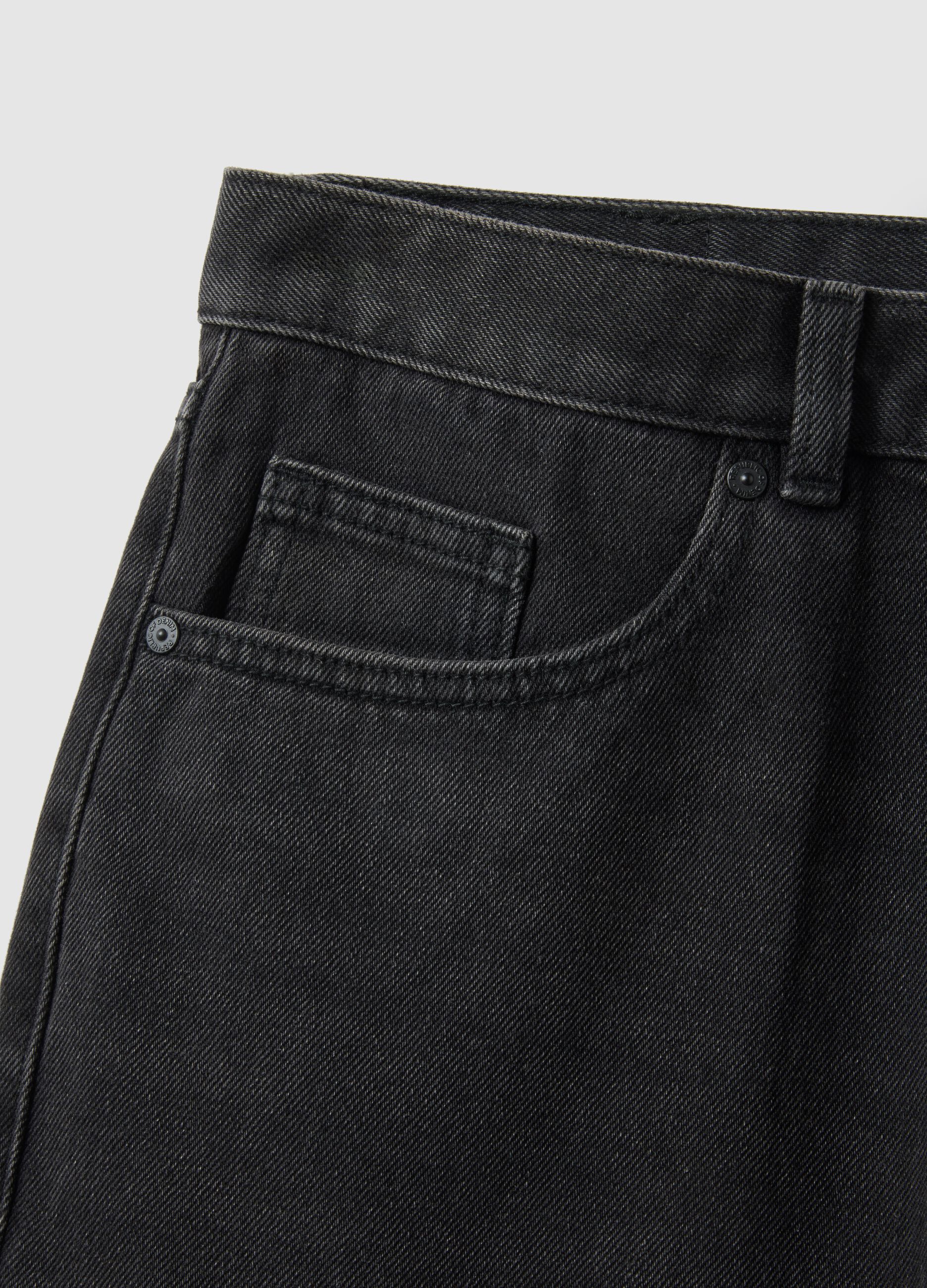 Black cotton blend jeans with regular tapered fit