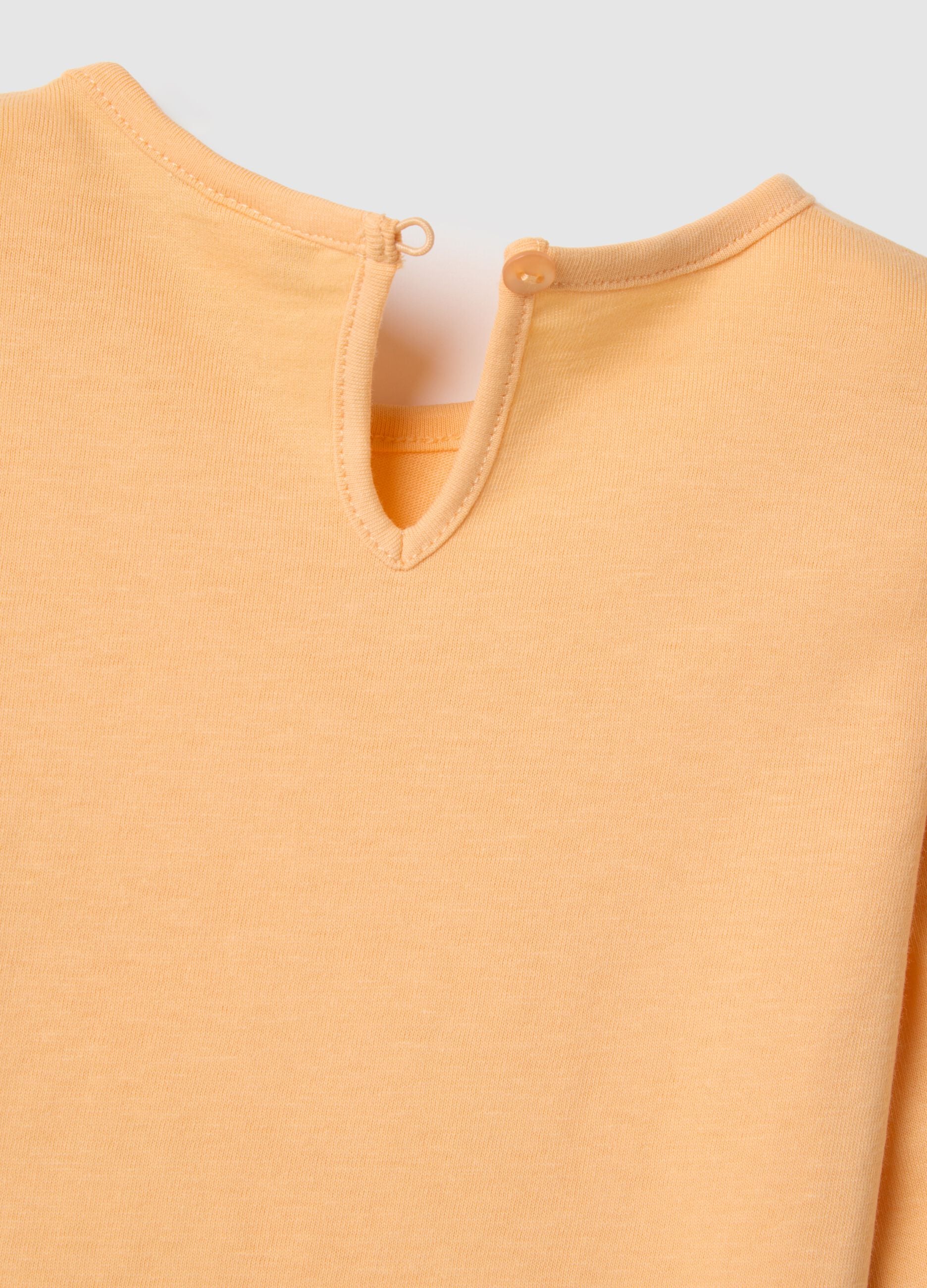 Orange long-sleeve pure cotton girl's T-shirt with prints