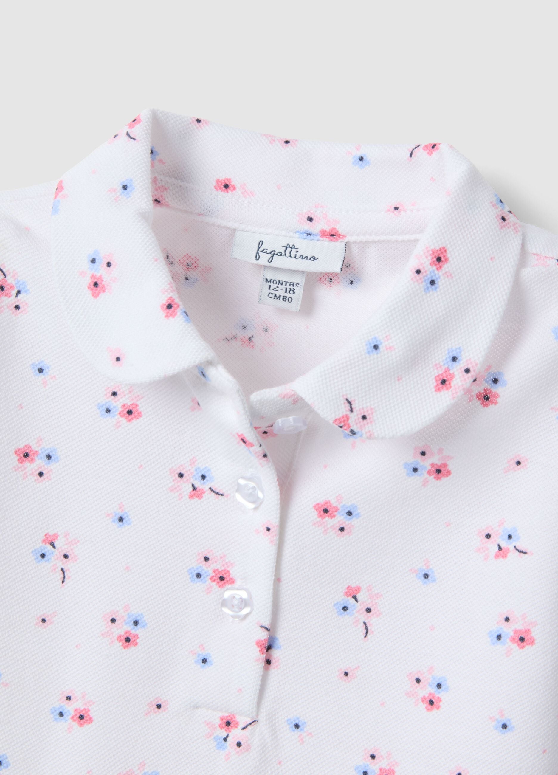 Girls' pure cotton white polo with floral pattern, regular fit