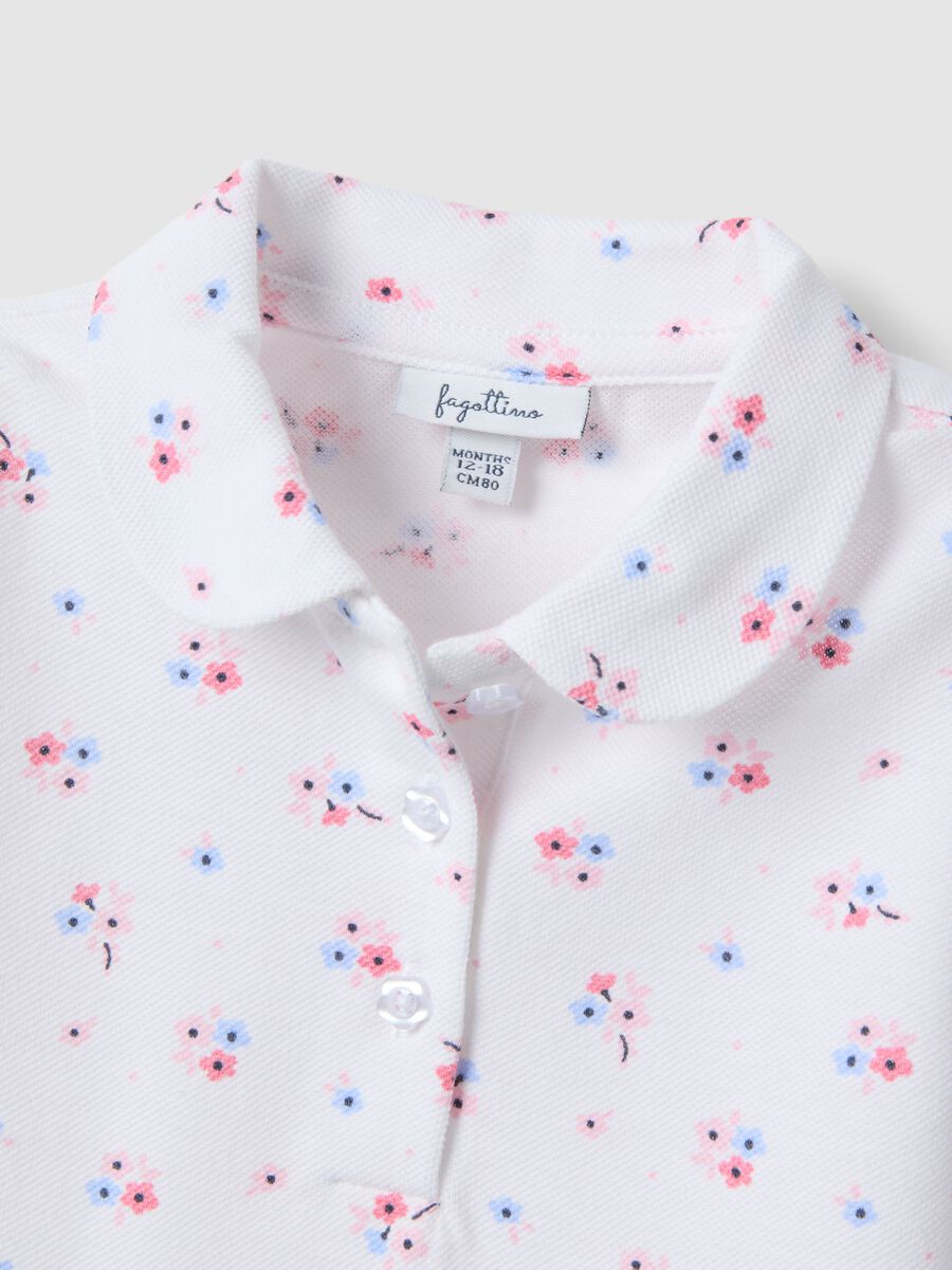 Polo in puro cotone bianca da bimba regular fit con motivo floreale_3