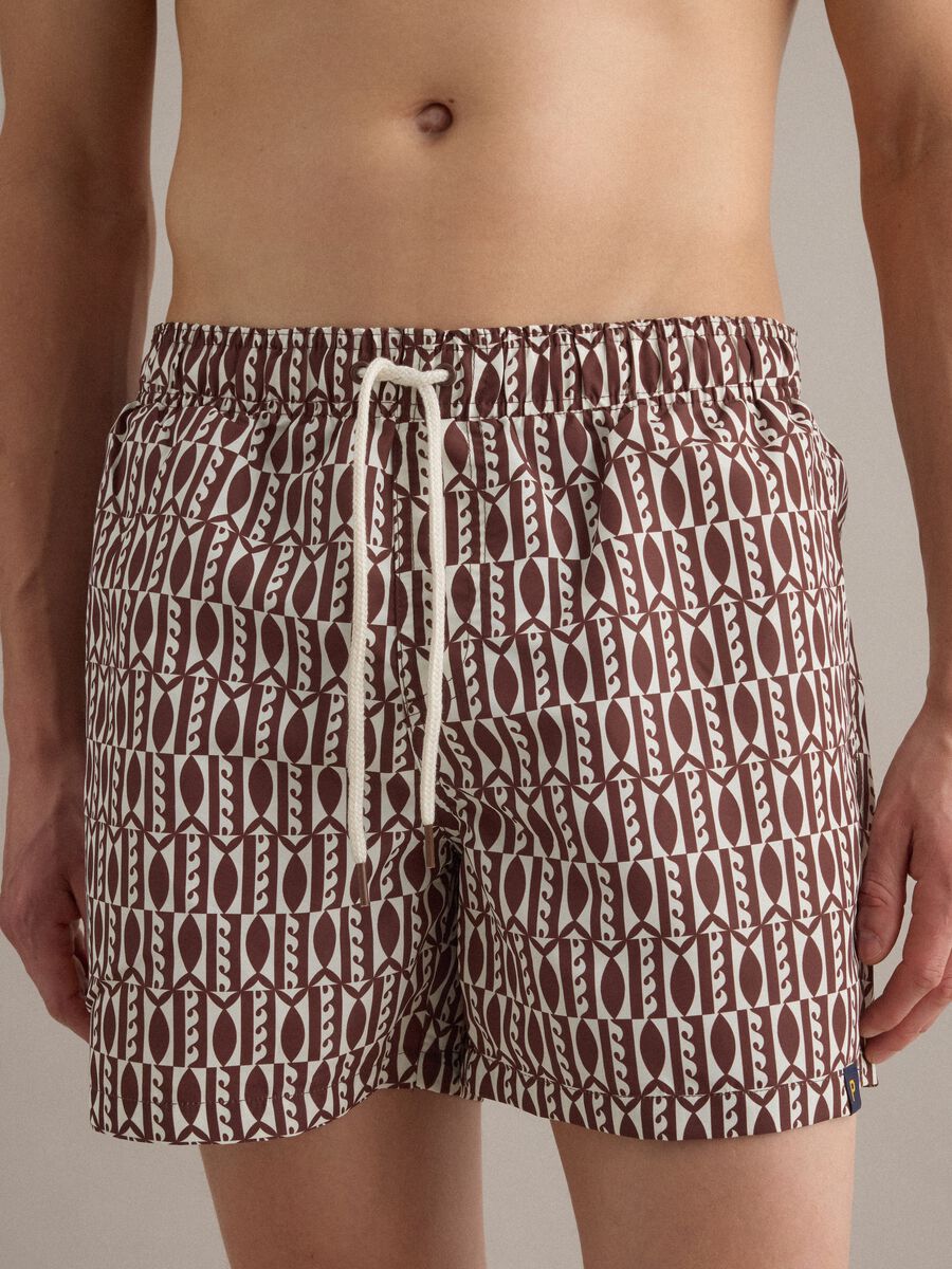 Brown geometric-print swim shorts_1