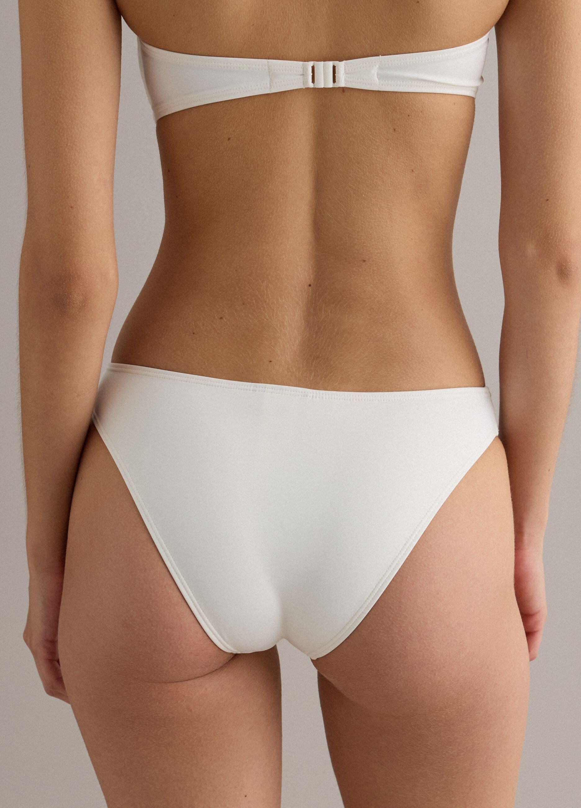 White stretch-fabric bikini bottoms