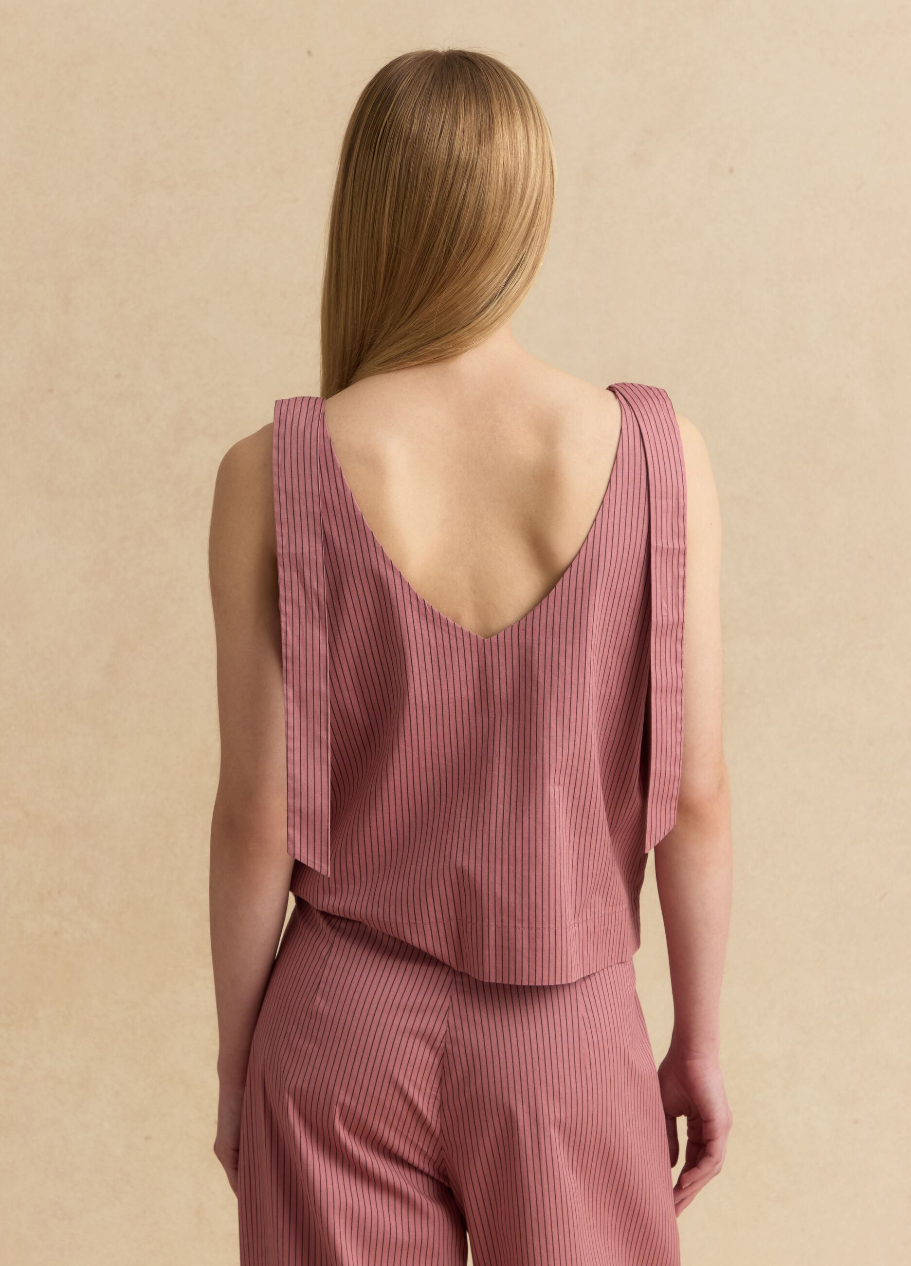 Pink stretch-cotton blouse with tie shoulder straps