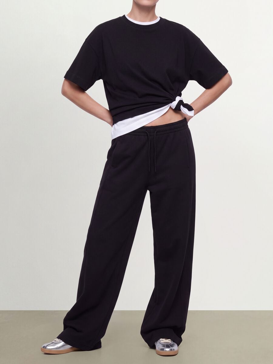 Black barrel-fit cotton-blend joggers_1