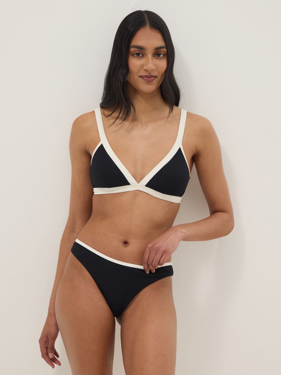 Black stretch-fabric bikini top with white trim and straps_1