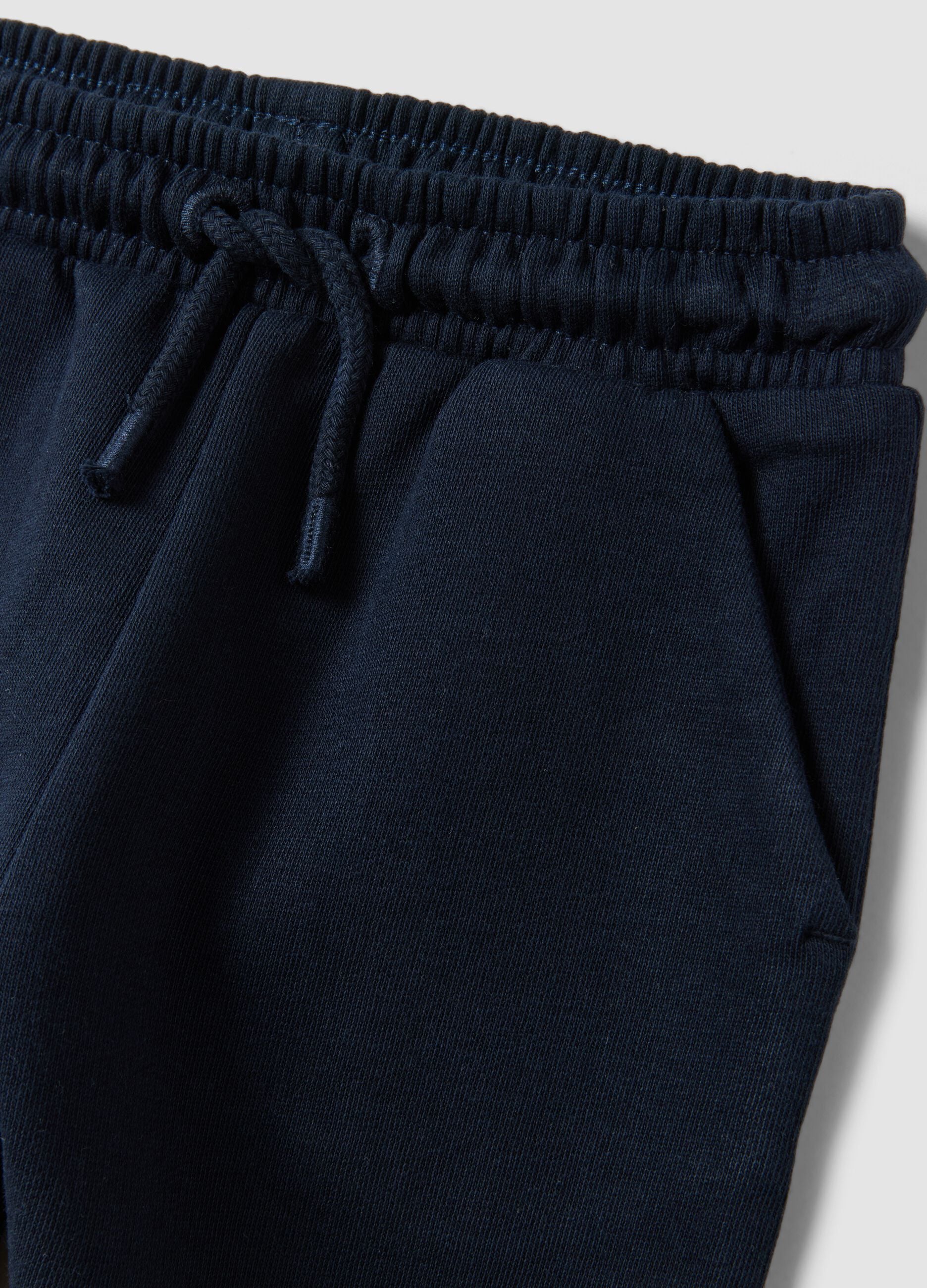 Blue jogger trousers in pure organic cotton with drawstring for baby boys