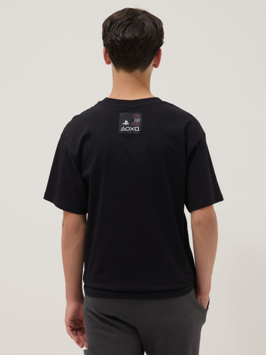 T-shirt nera da ragazzo con logo Playstation in puro cotone relaxed fit_1